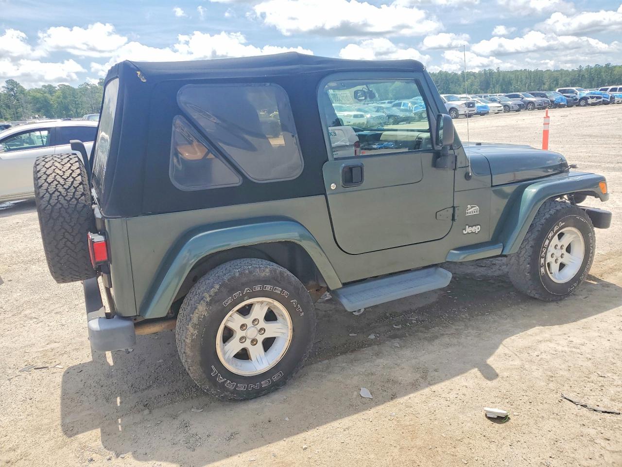 2004 Jeep Wrangler / Tj Sahara Green vin: 1J4FA59S64P768436