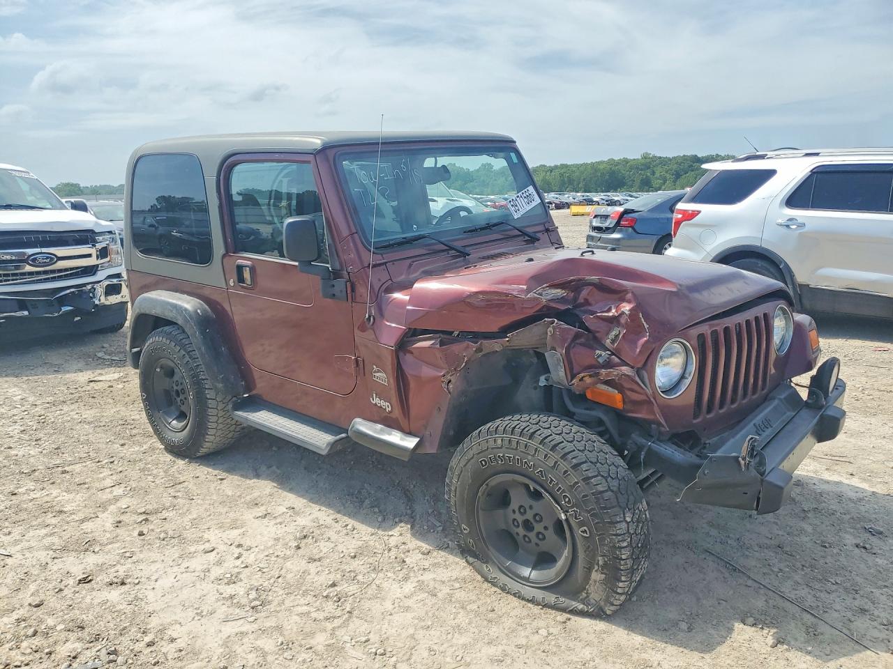 2003 Jeep Wrangler / Tj Sahara Maroon vin: 1J4FA59S73P352281