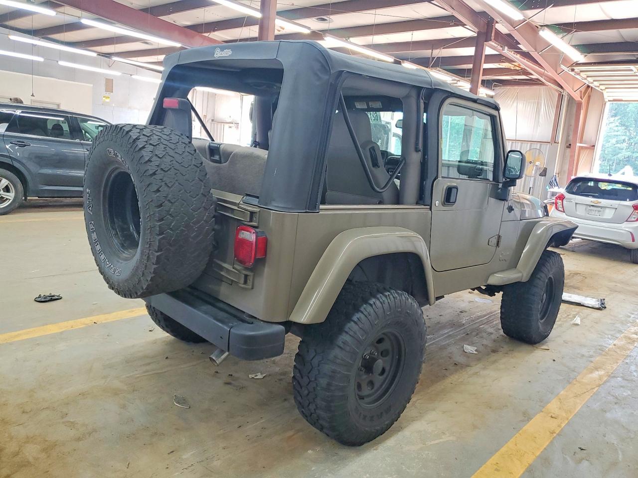 2004 Jeep Wrangler / Tj Sahara Green vin: 1J4FA59S74P716782