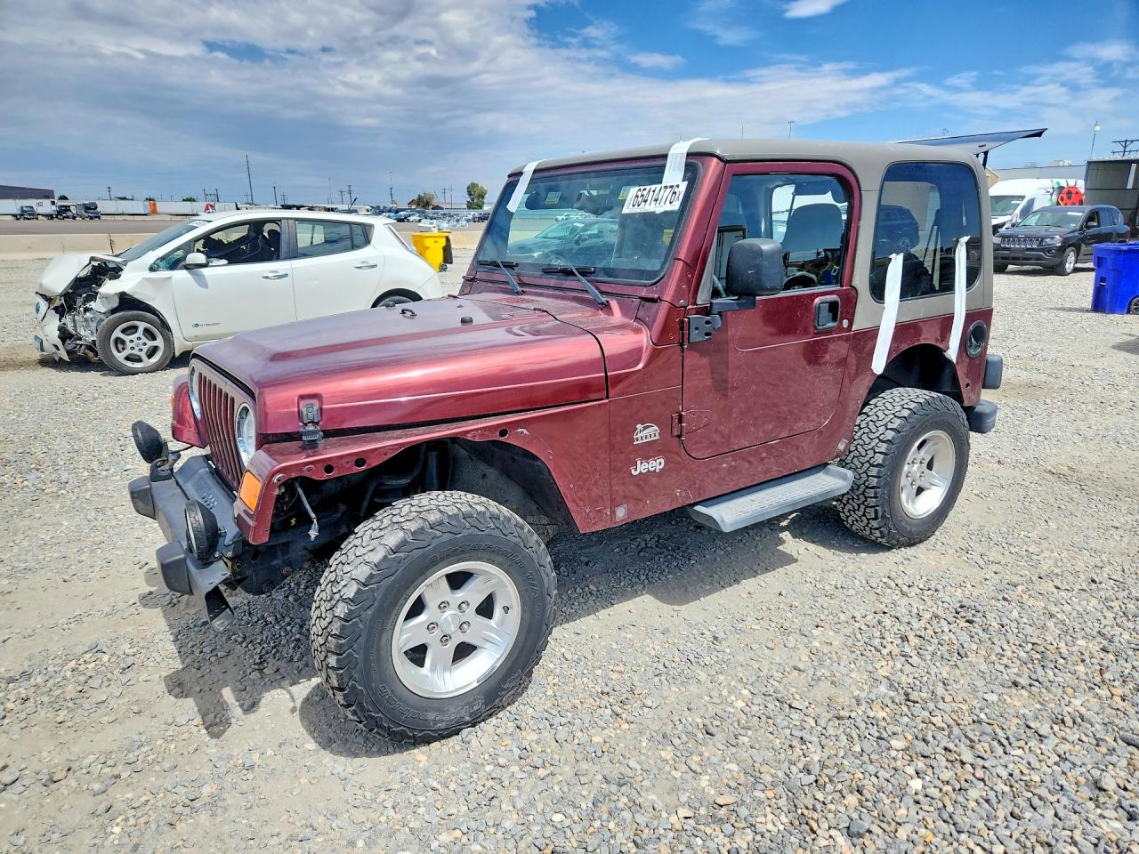 2004 Jeep Wrangler / Tj Sahara Burgundy vin: 1J4FA59S84P703457