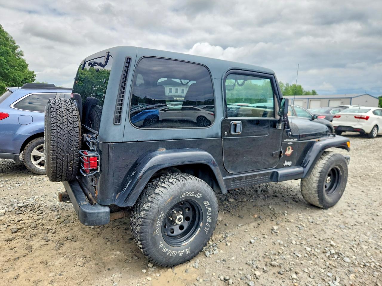 2001 Jeep Wrangler / Tj Sahara Black vin: 1J4FA59S91P316718