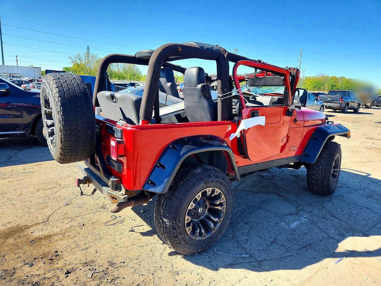 2004 Jeep Wrangler / Tj Rubicon Red vin: 1J4FA69S54P776324