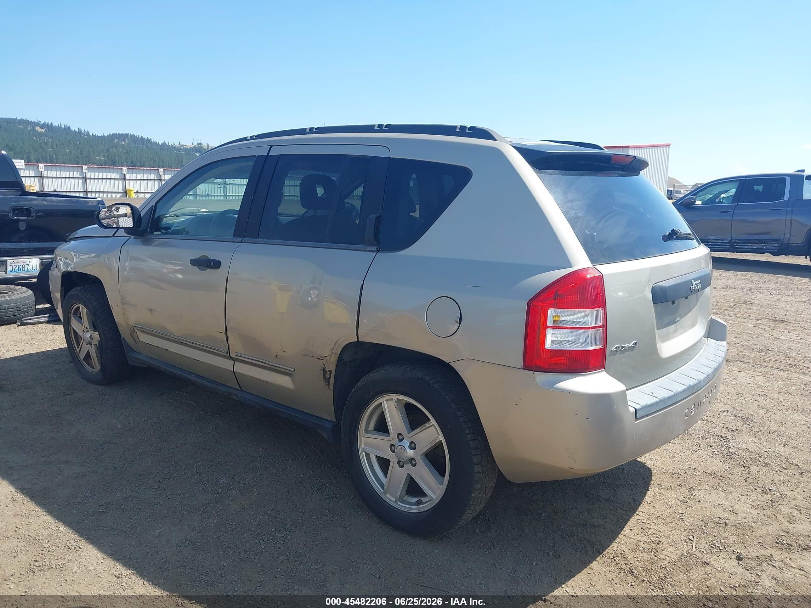 2009 Jeep Compass Sport Champagne vin: 1J4FF47B19D205995