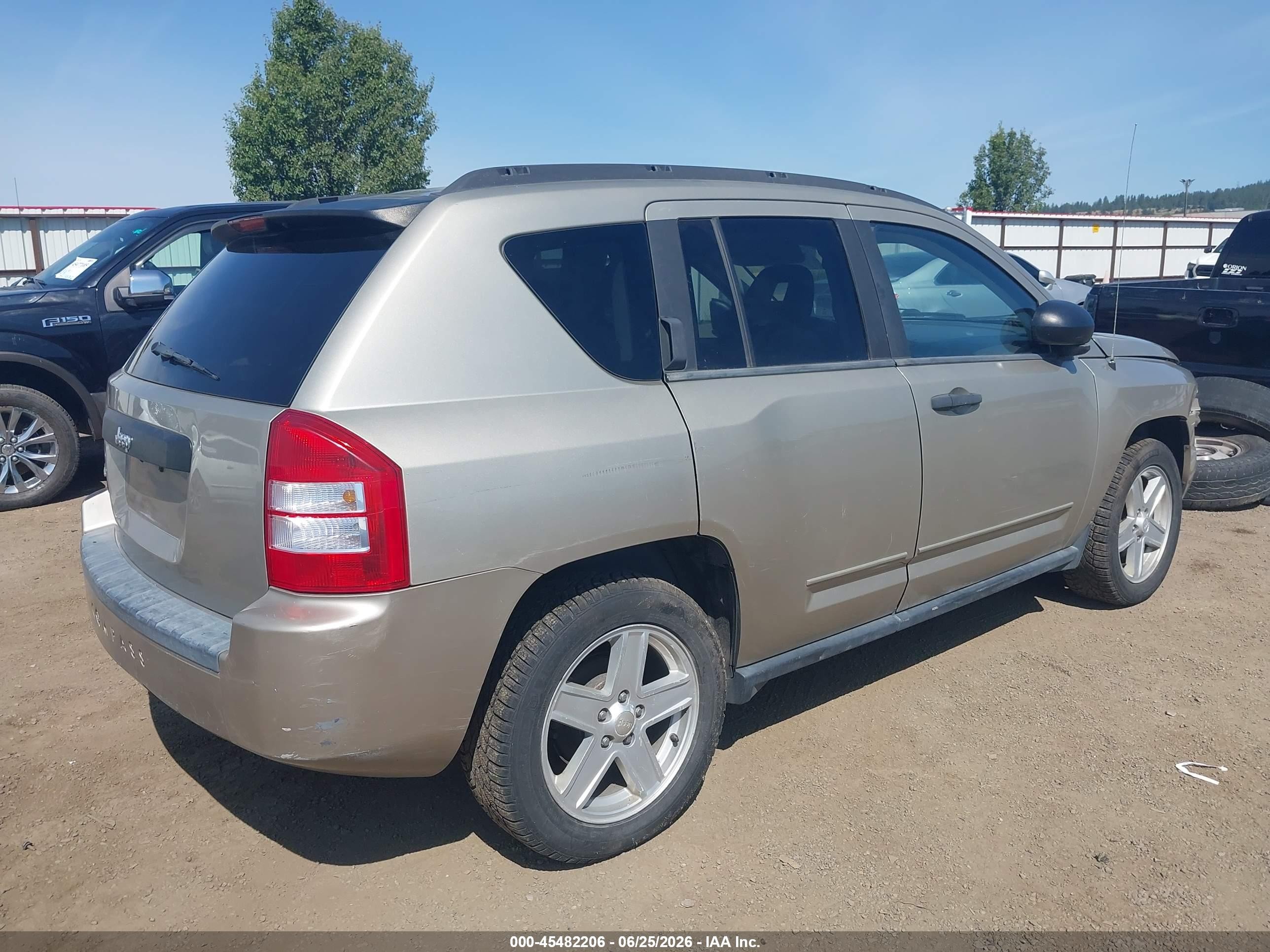 2009 Jeep Compass Sport Champagne vin: 1J4FF47B19D205995
