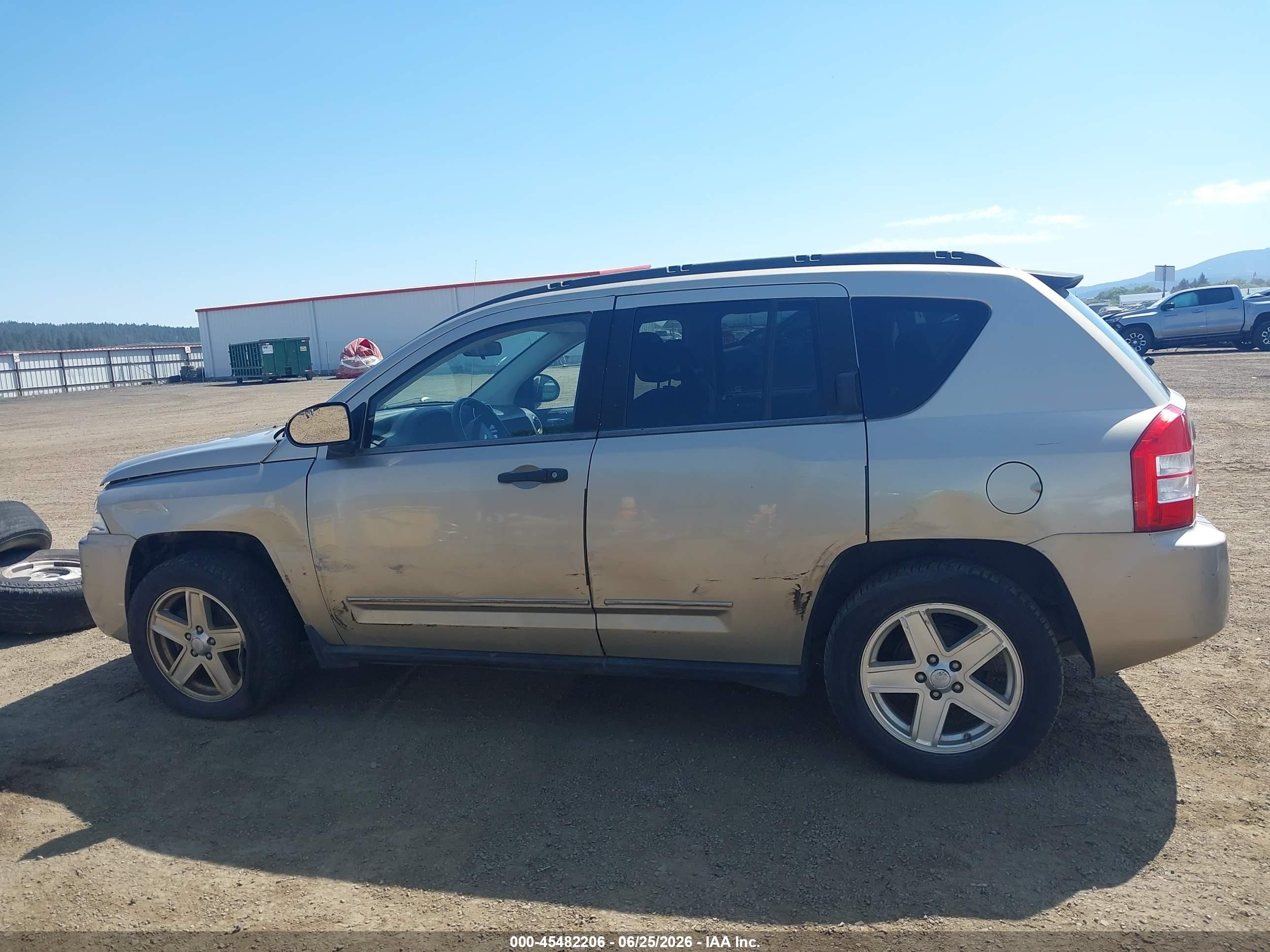 2009 Jeep Compass Sport Champagne vin: 1J4FF47B19D205995