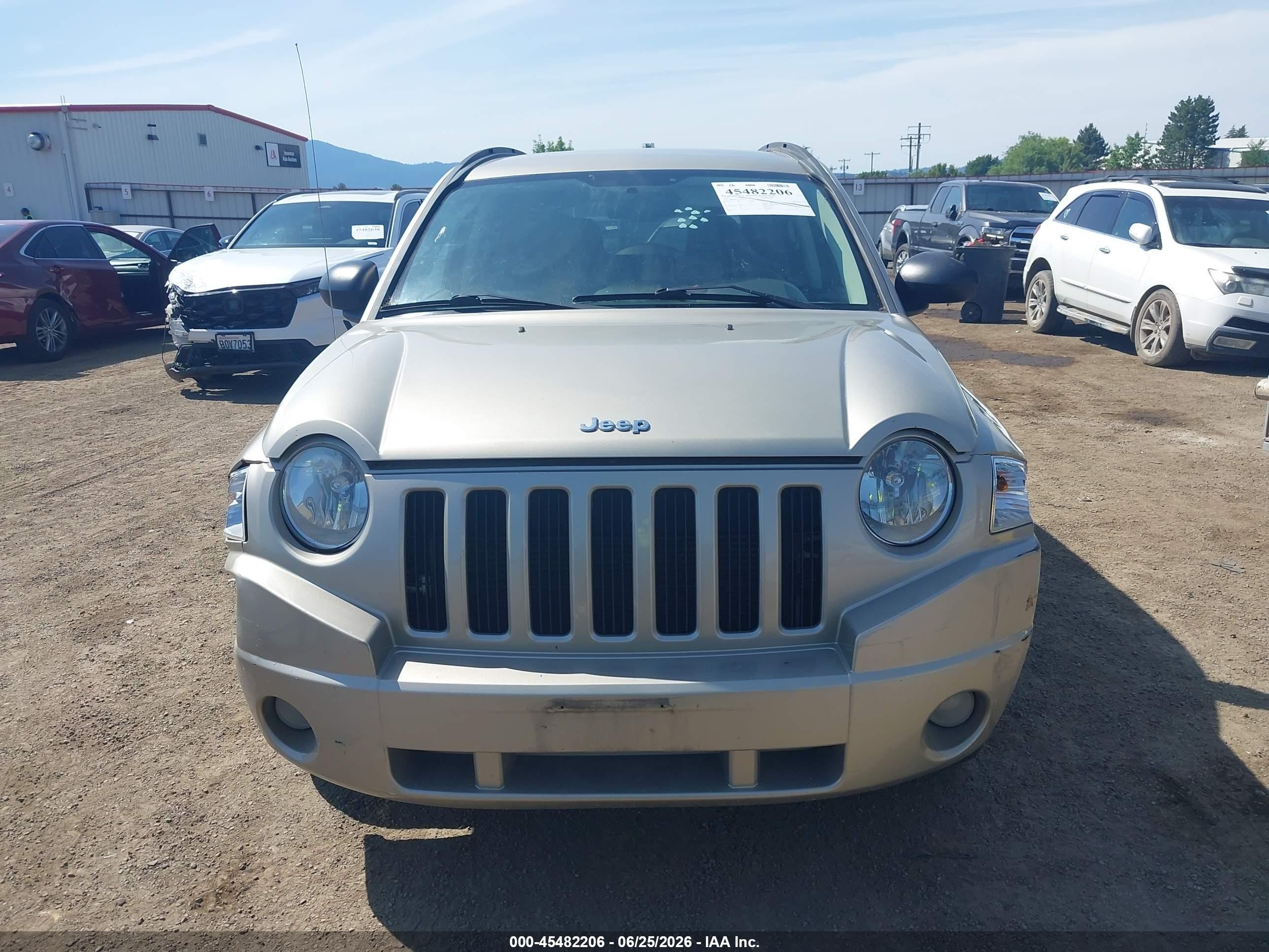 2009 Jeep Compass Sport Champagne vin: 1J4FF47B19D205995