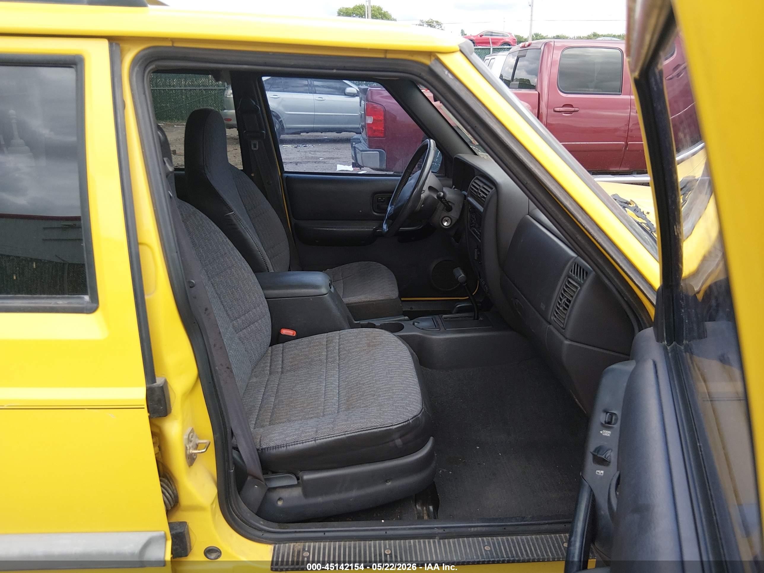 2001 Jeep Cherokee Sport Yellow vin: 1J4FF48S91L581840