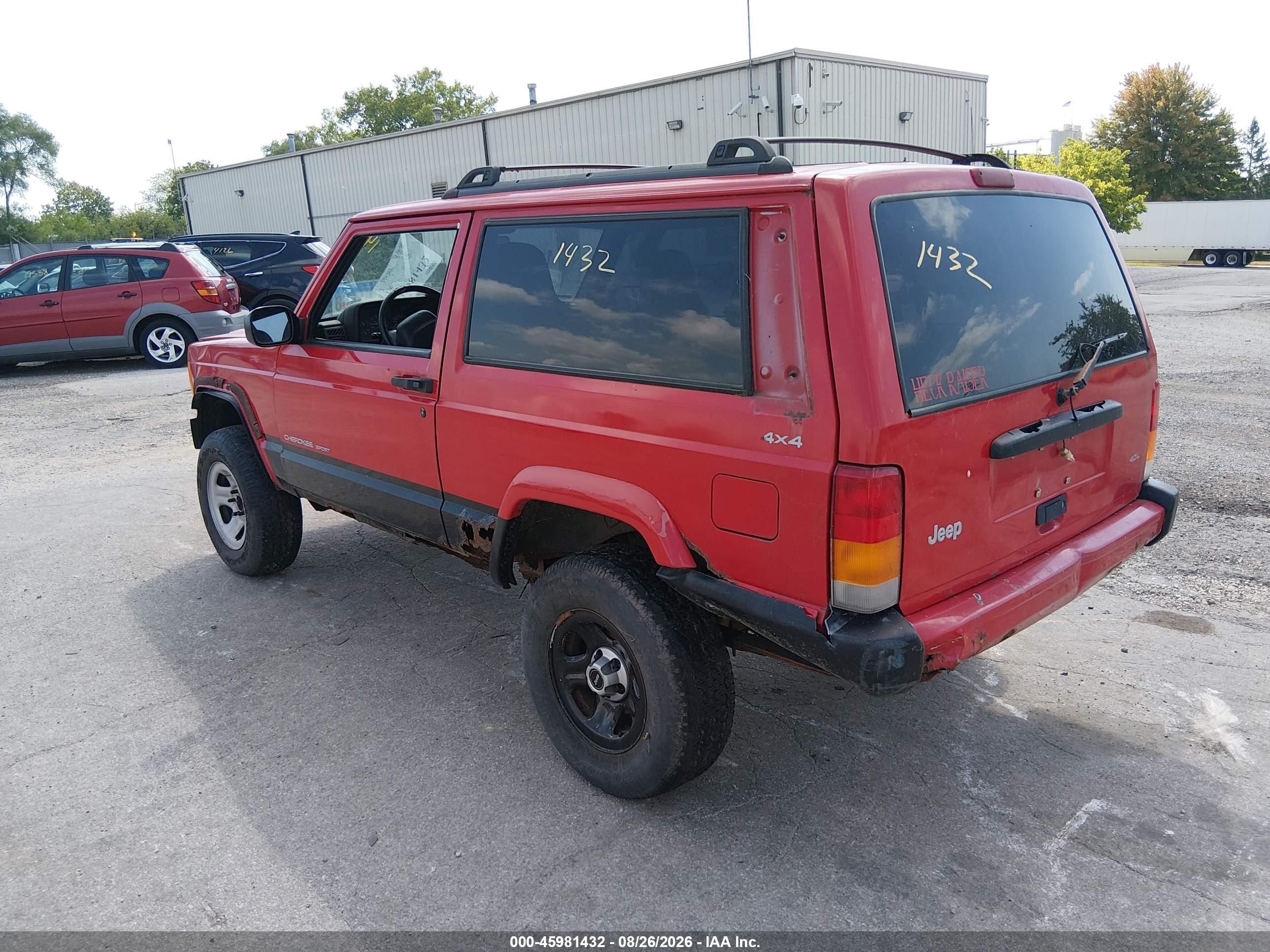 1999 Jeep Cherokee Sport Red vin: 1J4FF67S6XL556822