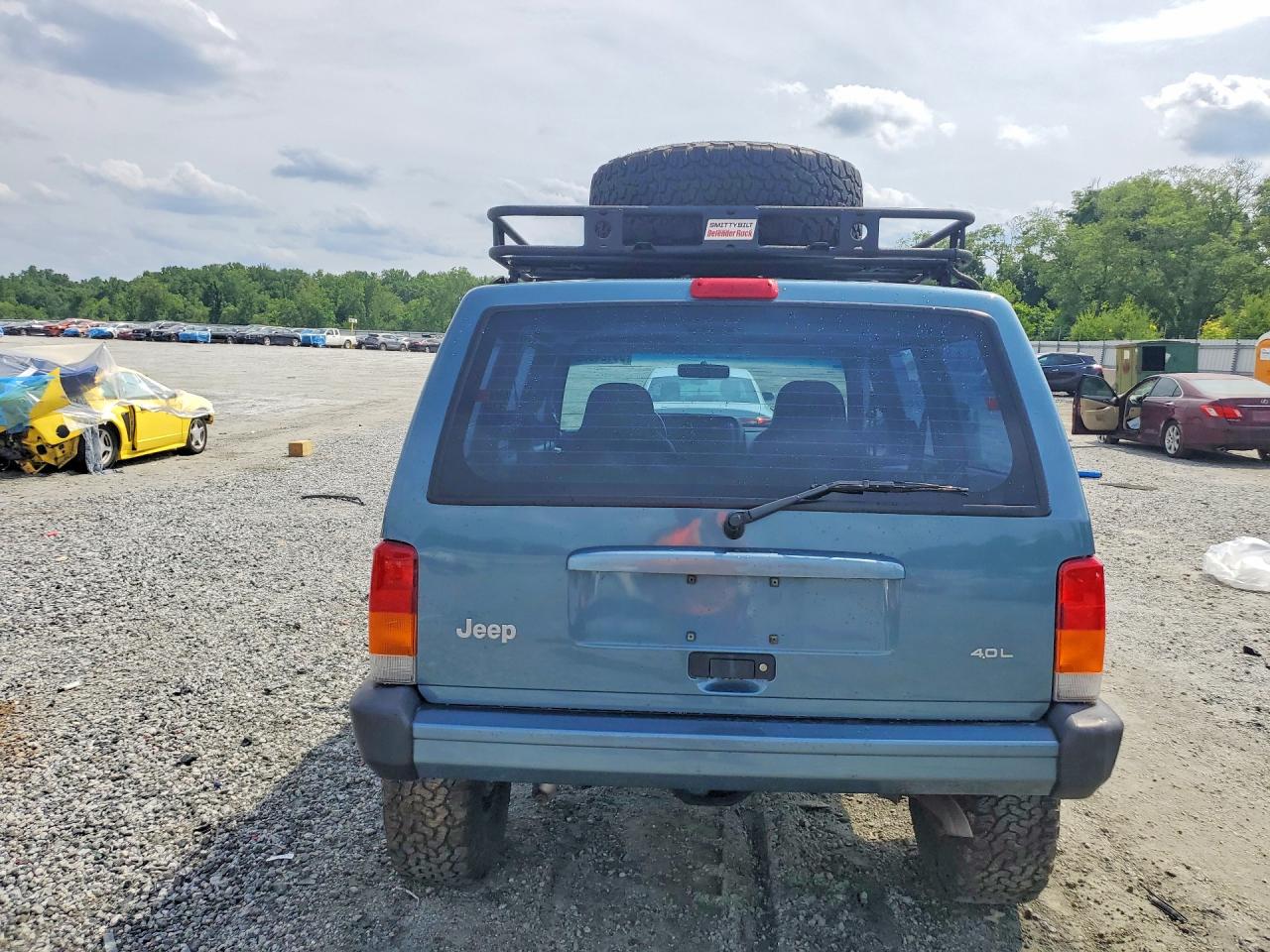1999 Jeep Cherokee Sport Blue vin: 1J4FF68S2XL634687