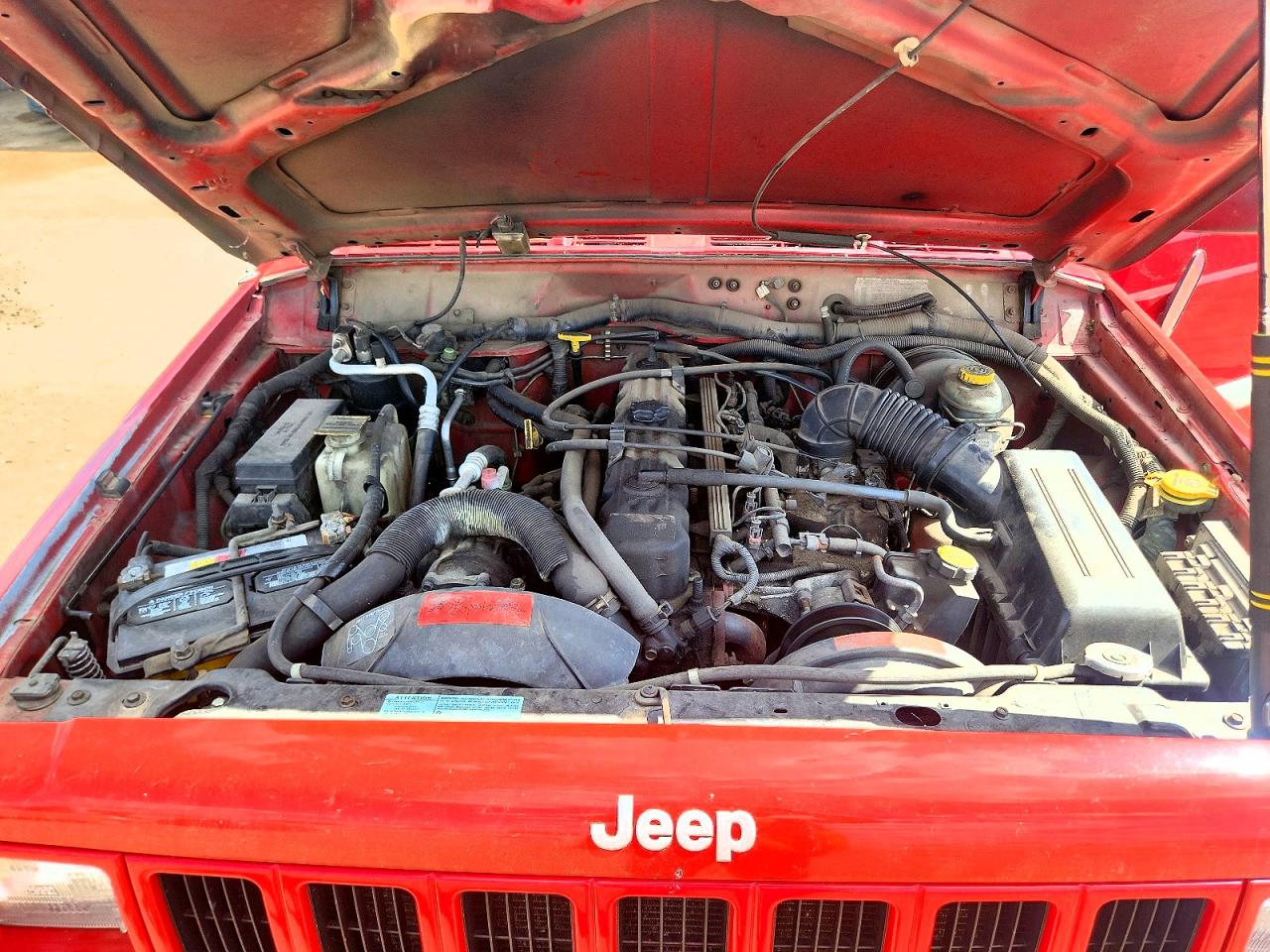 1999 Jeep Cherokee Sport Red vin: 1J4FF68S6XL550551