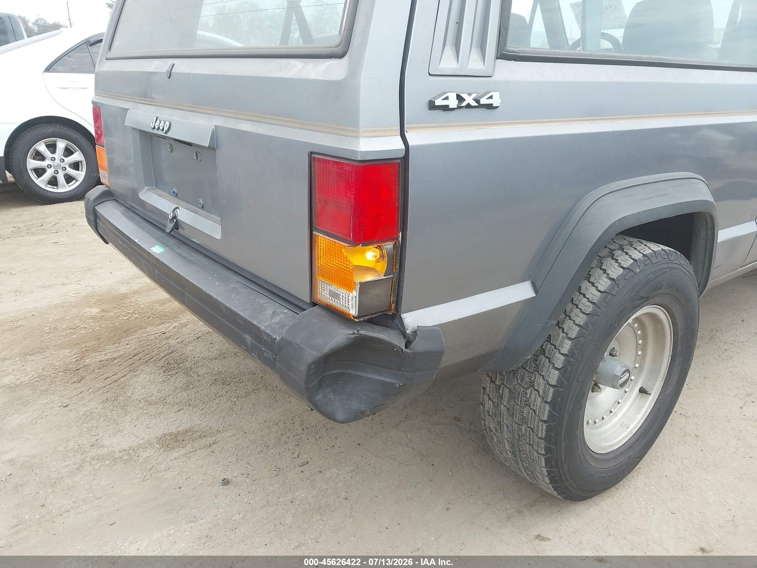 1991 Jeep Cherokee   Light Blue vin: 1J4FJ27P8ML556884