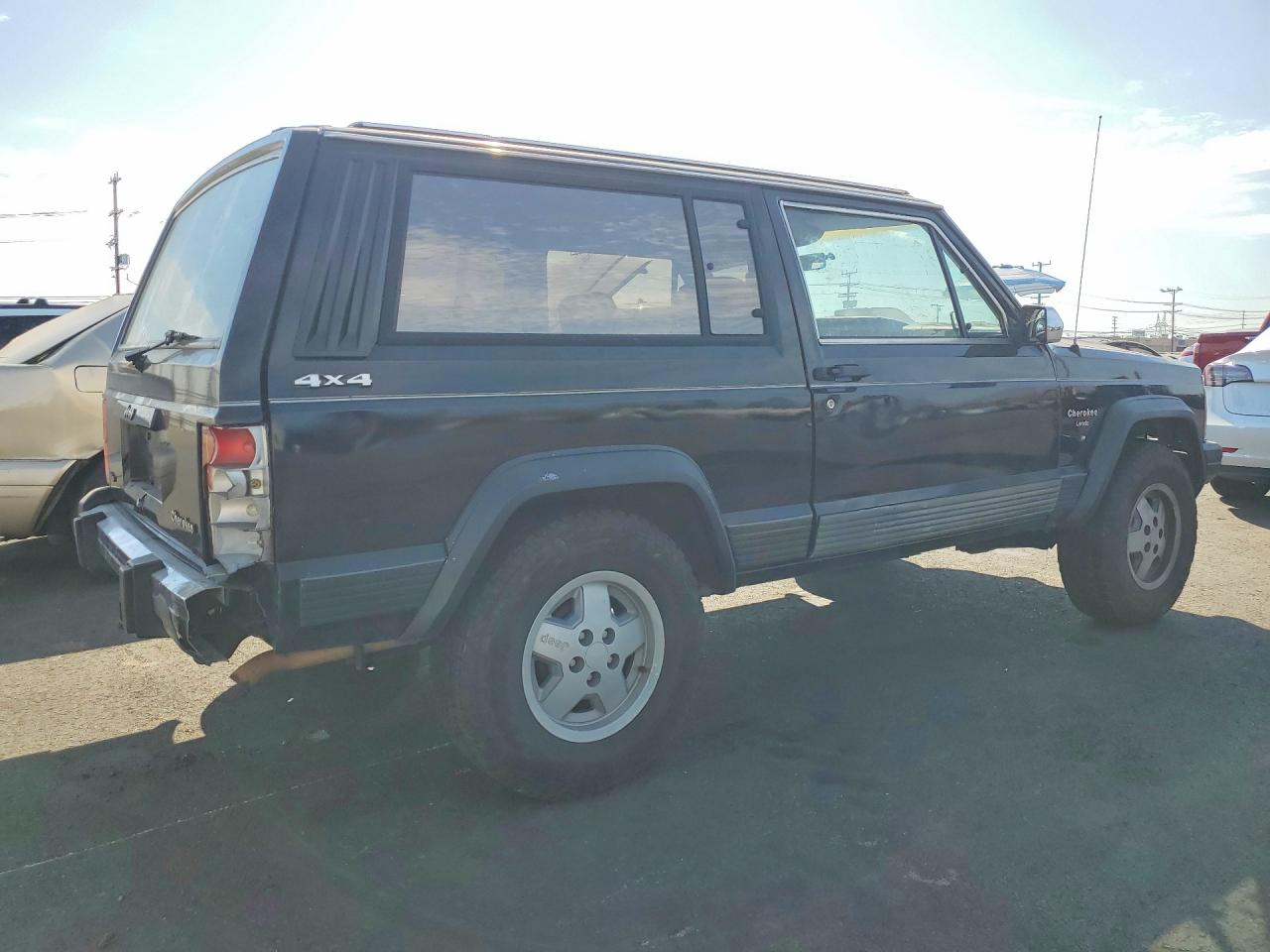 1990 Jeep Cherokee Laredo Black vin: 1J4FJ57L0LL286627