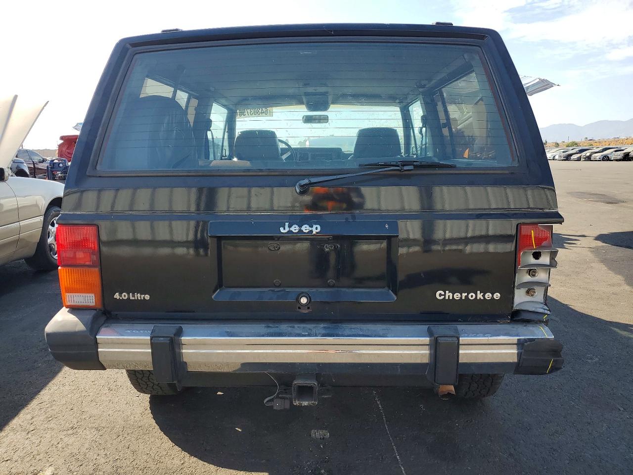 1990 Jeep Cherokee Laredo Black vin: 1J4FJ57L0LL286627