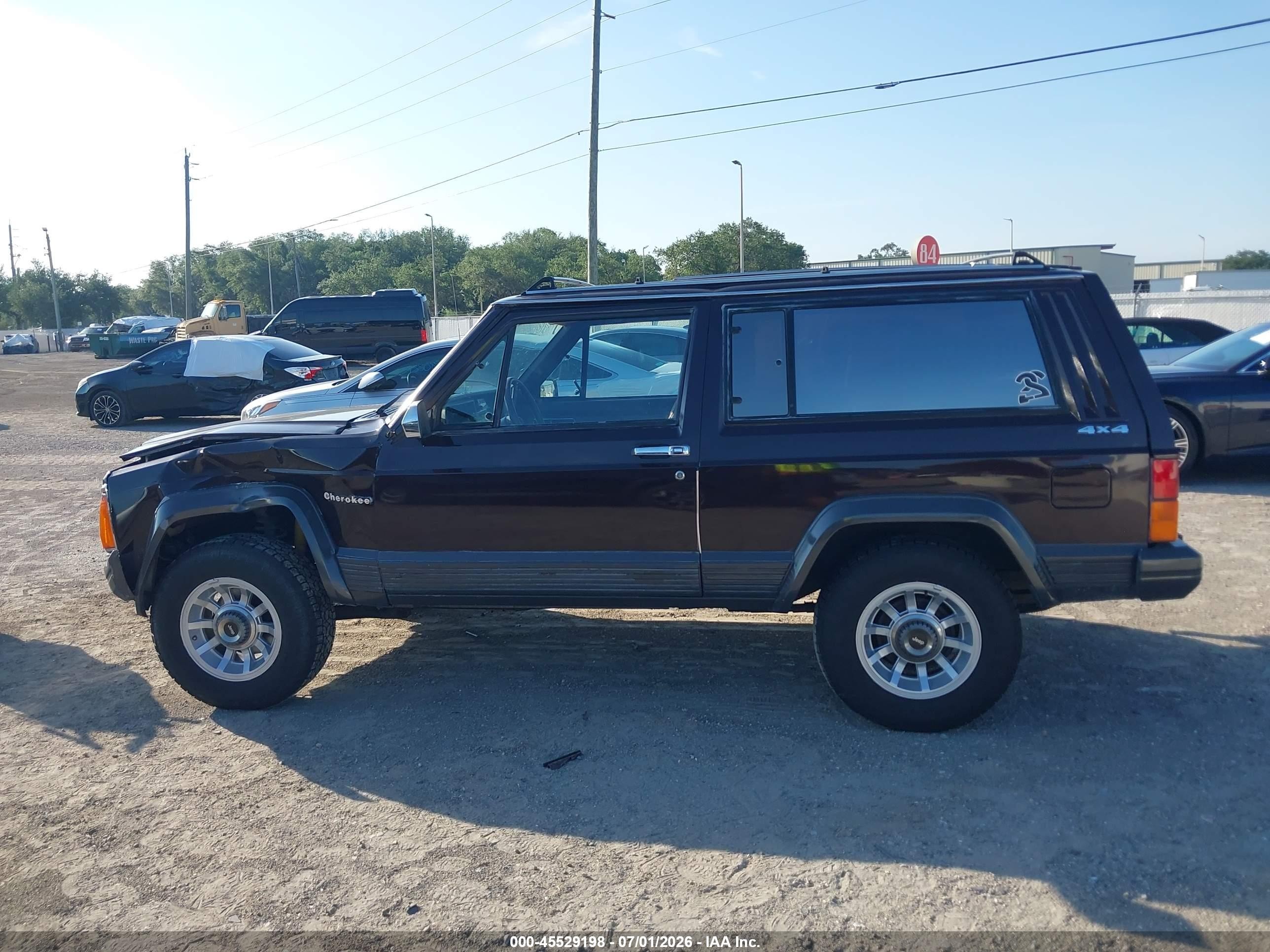 1989 Jeep Cherokee Laredo Burgundy vin: 1J4FJ57LXKL596668