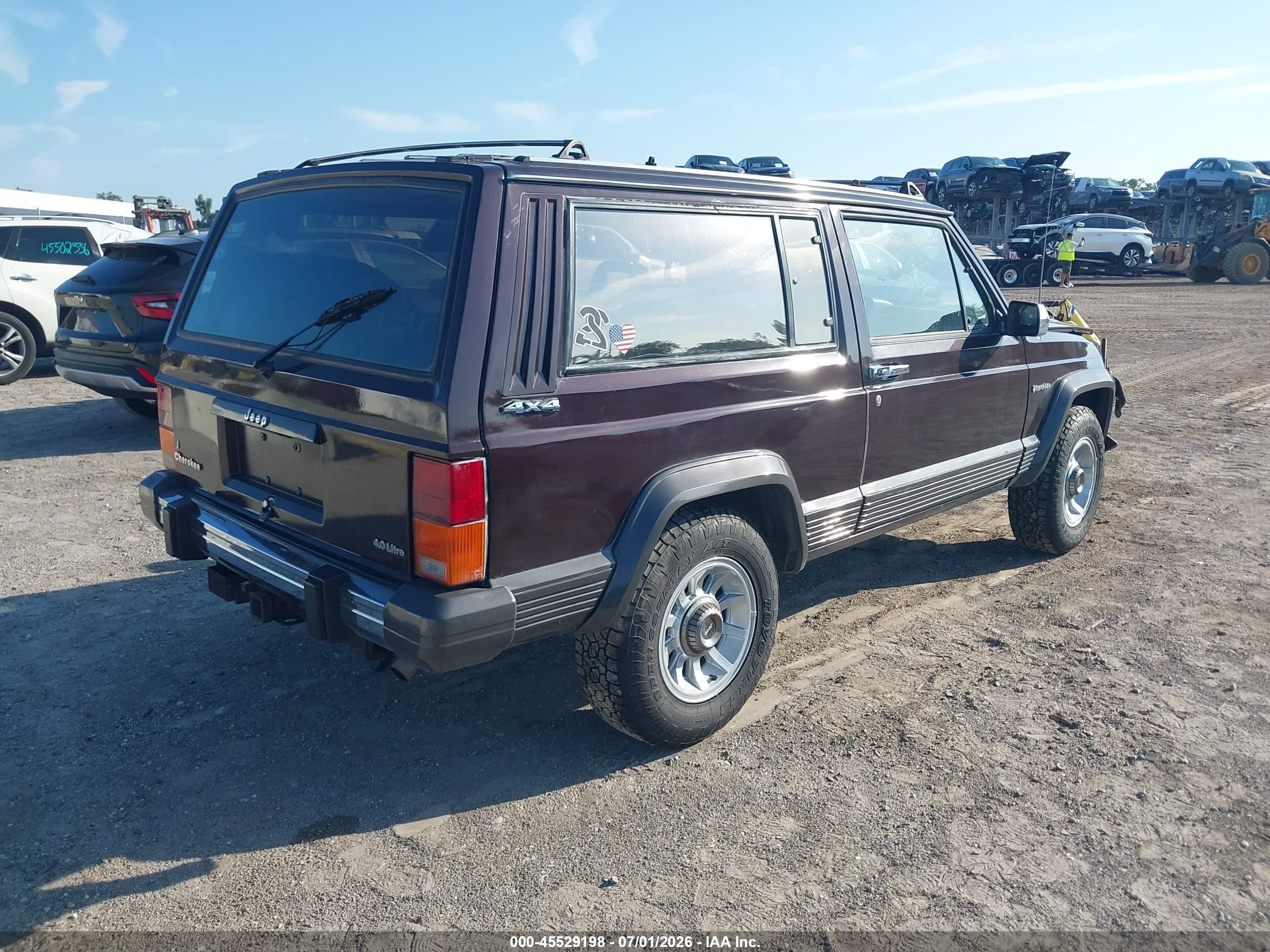 1989 Jeep Cherokee Laredo Burgundy vin: 1J4FJ57LXKL596668