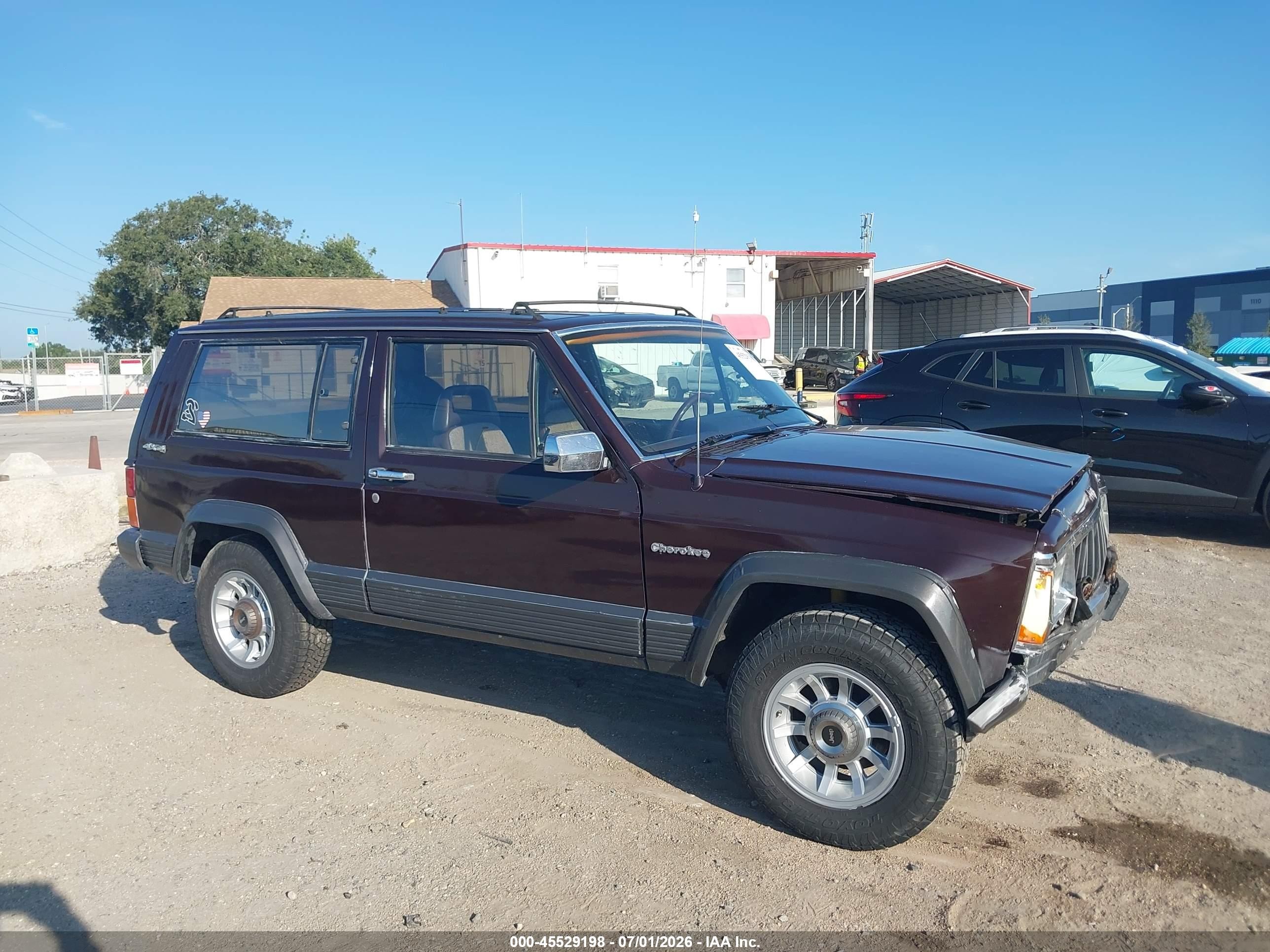 1989 Jeep Cherokee Laredo Burgundy vin: 1J4FJ57LXKL596668