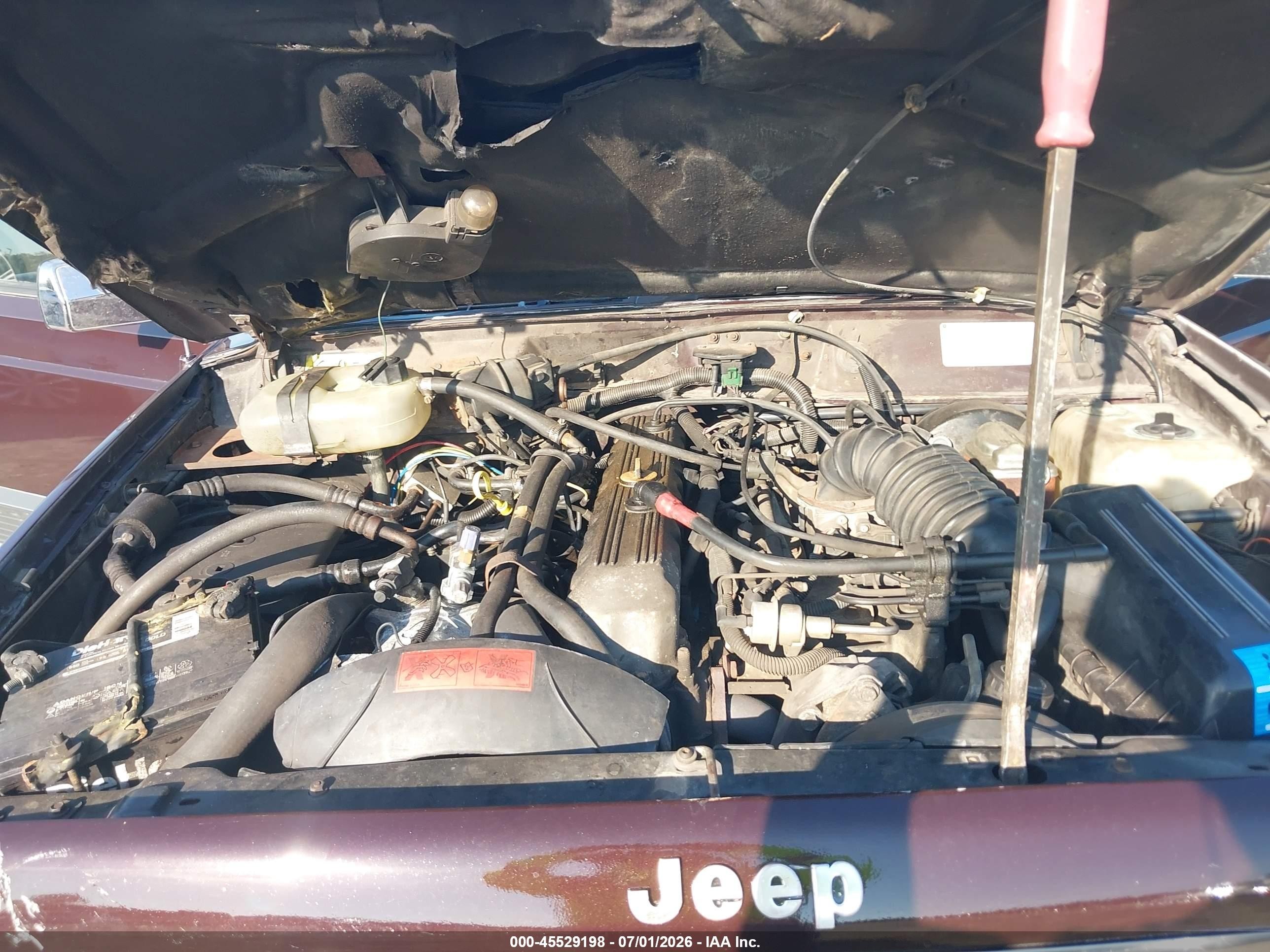 1989 Jeep Cherokee Laredo Burgundy vin: 1J4FJ57LXKL596668