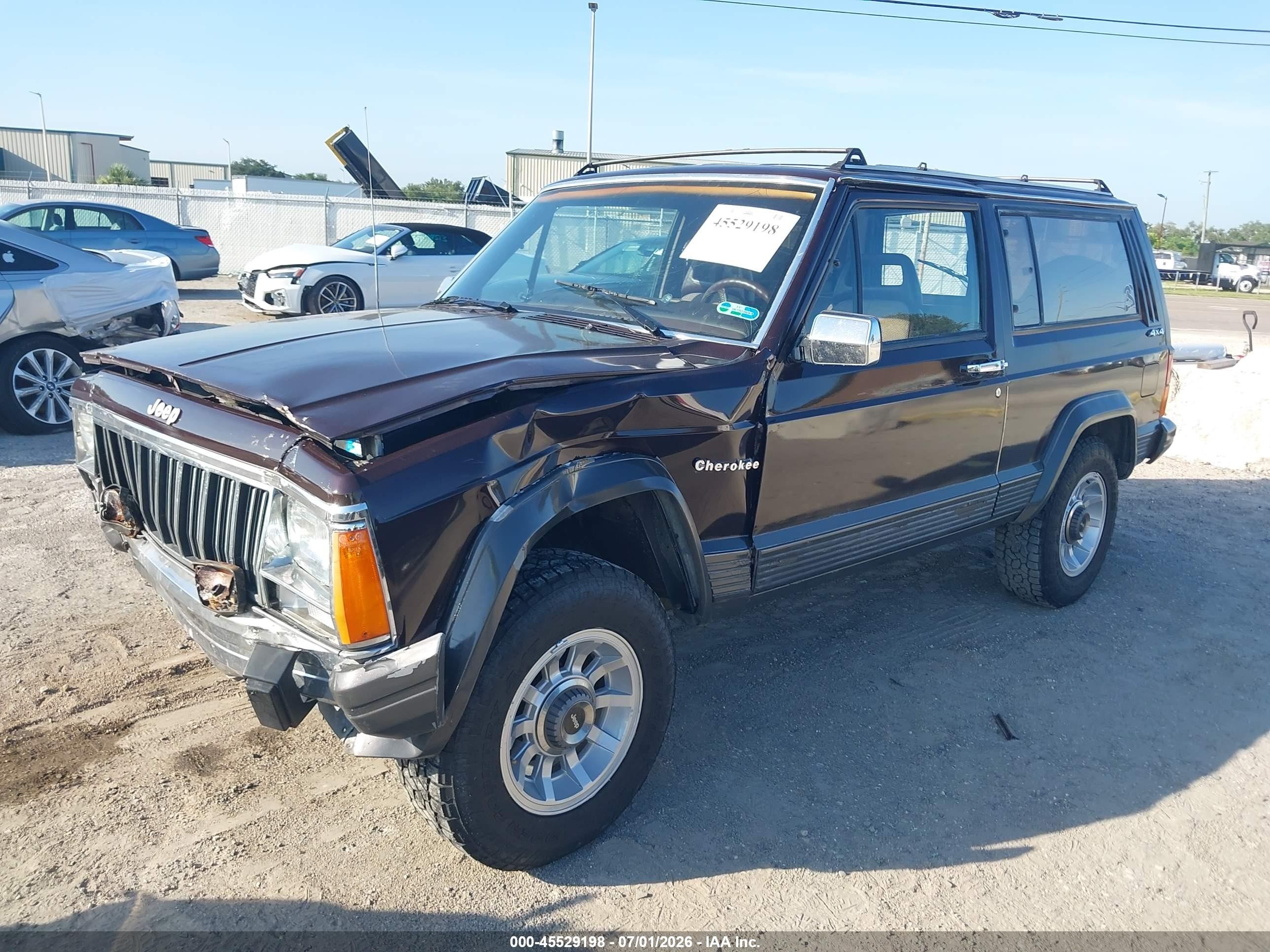 1989 Jeep Cherokee Laredo Burgundy vin: 1J4FJ57LXKL596668