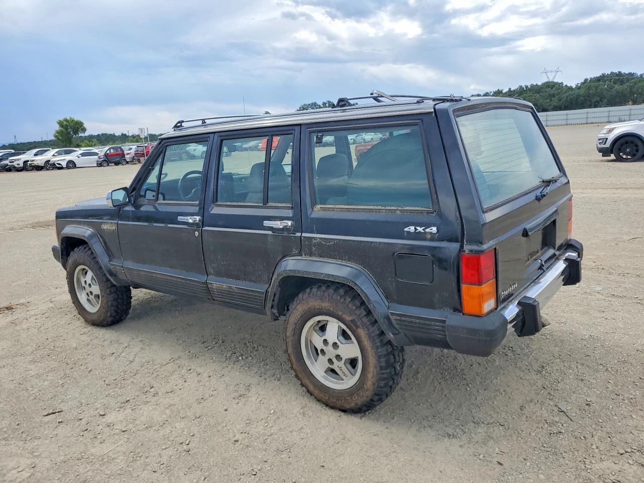 1989 Jeep Cherokee Laredo Black vin: 1J4FJ58L6KL596486