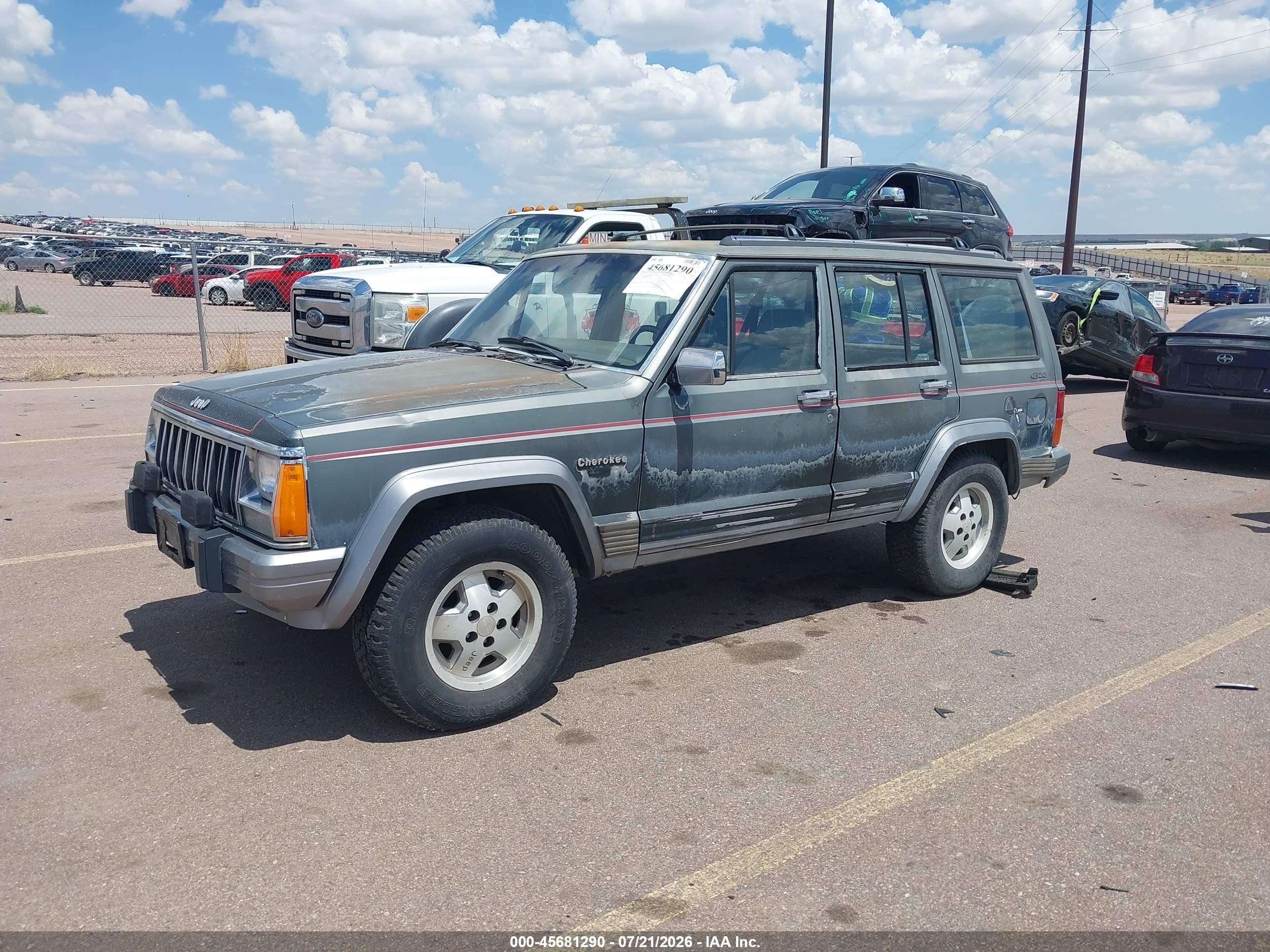 1991 Jeep Cherokee Laredo Серый vin: 1J4FJ58S8ML570840