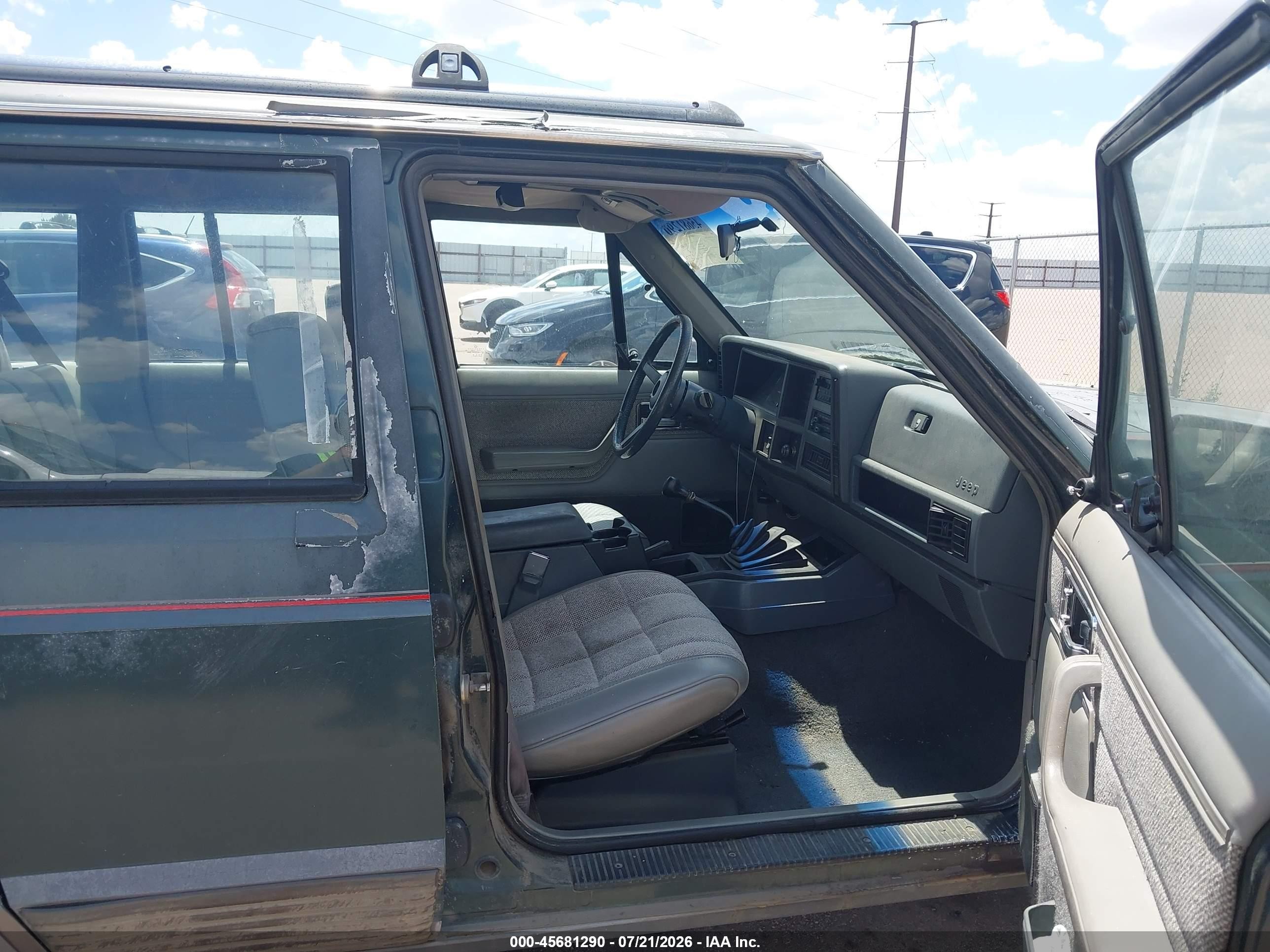 1991 Jeep Cherokee Laredo Серый vin: 1J4FJ58S8ML570840