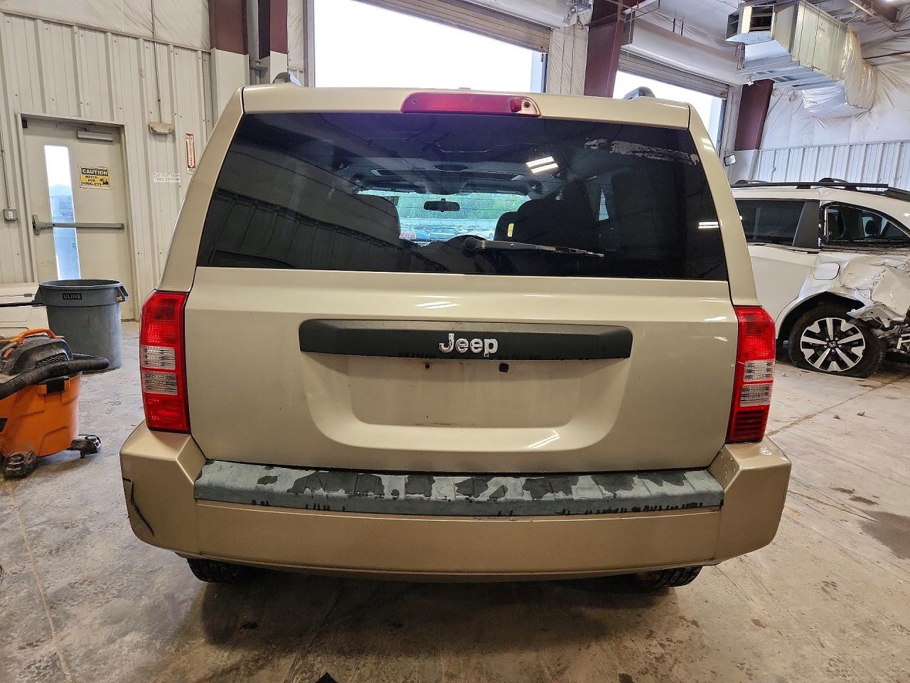 2009 Jeep Patriot Sport Tan vin: 1J4FT28B89D195087