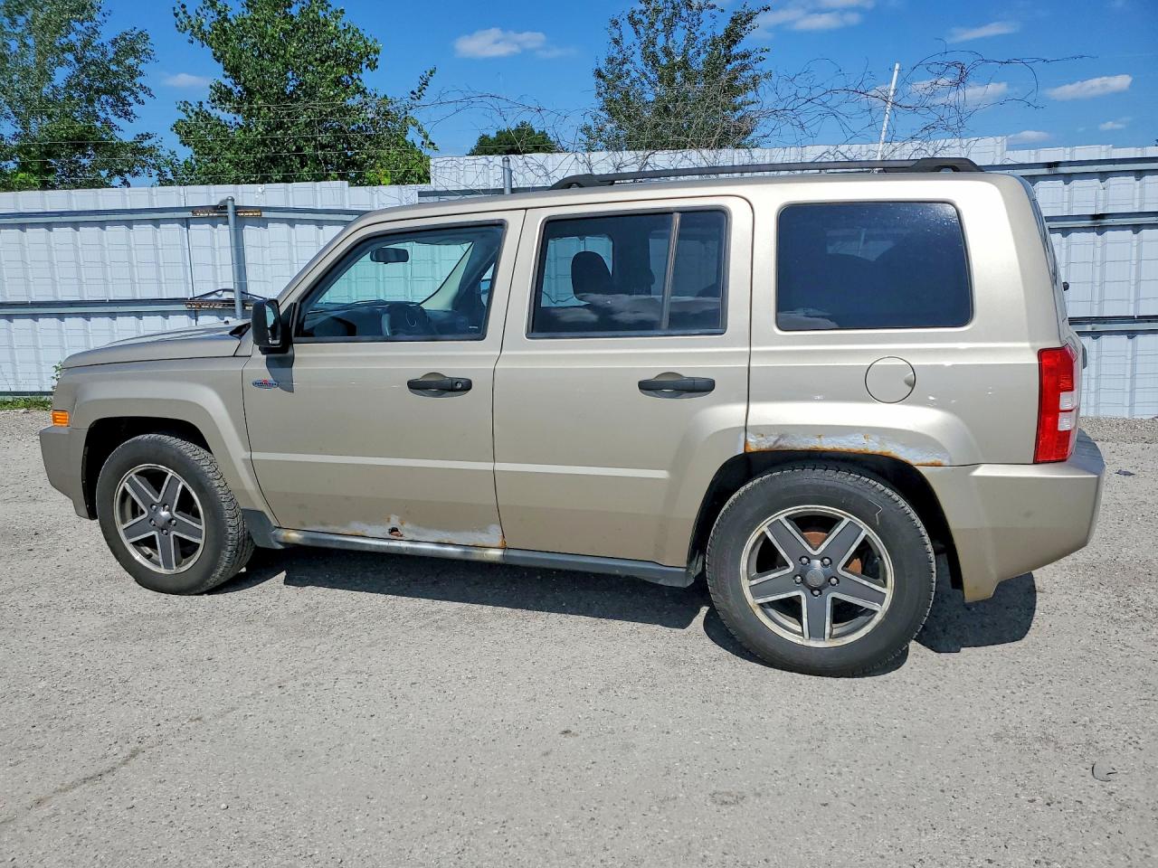 2009 Jeep Patriot Sport Tan vin: 1J4FT28B99D147324