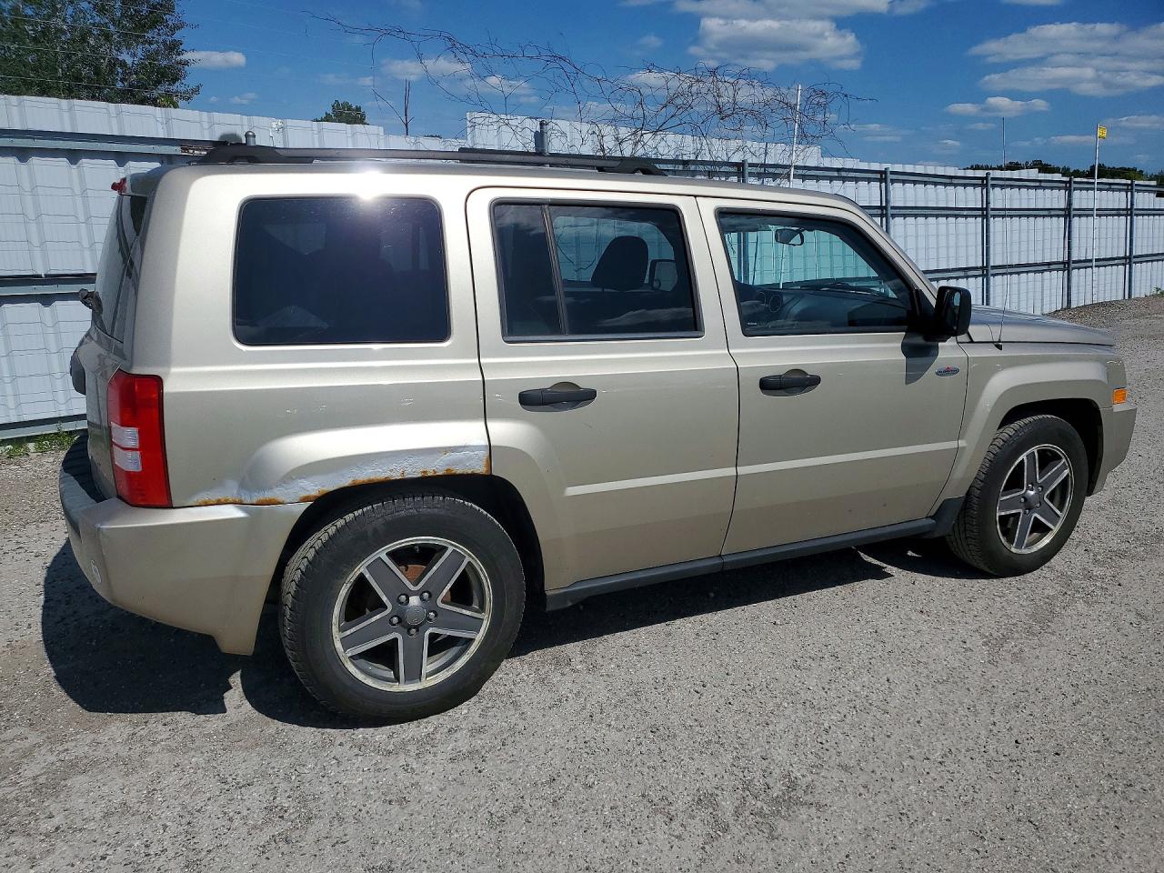 2009 Jeep Patriot Sport Tan vin: 1J4FT28B99D147324