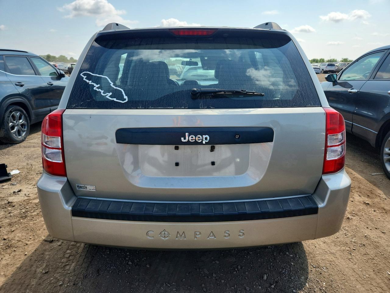 2009 Jeep Compass Sport Золотой vin: 1J4FT47A69D173853