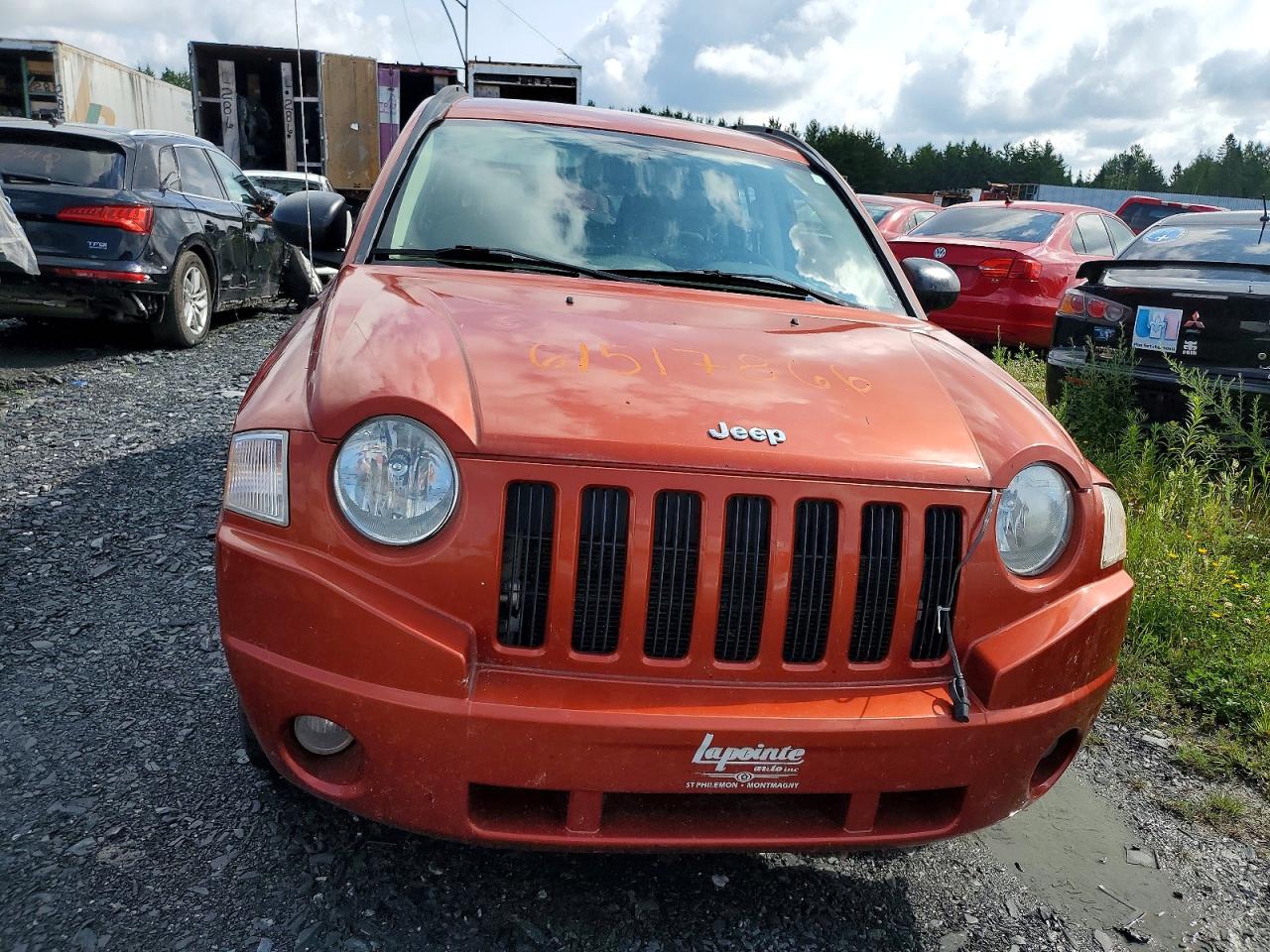 2009 Jeep Compass Sport Orange vin: 1J4FT47B19D195865