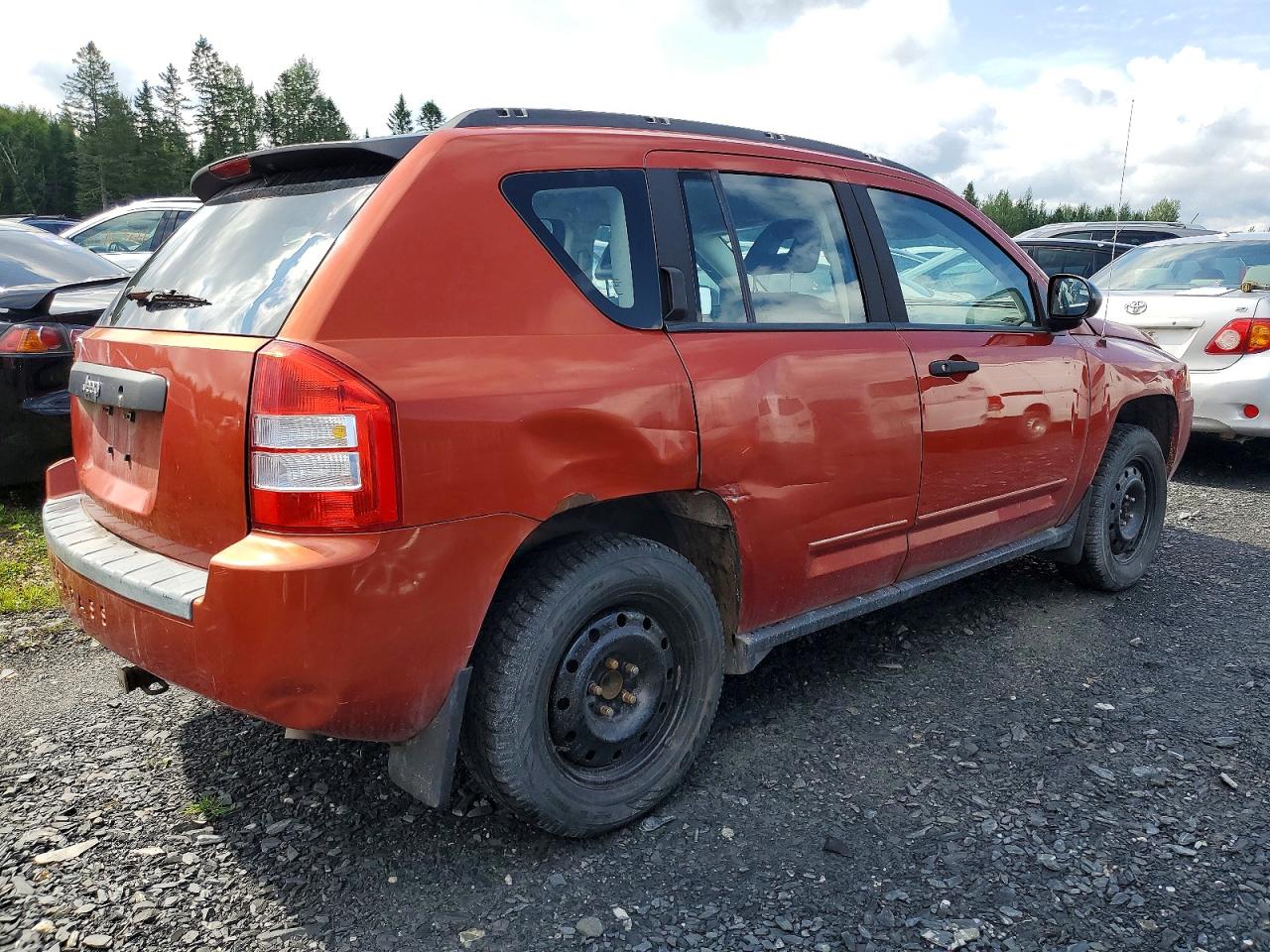 2009 Jeep Compass Sport Orange vin: 1J4FT47B19D195865