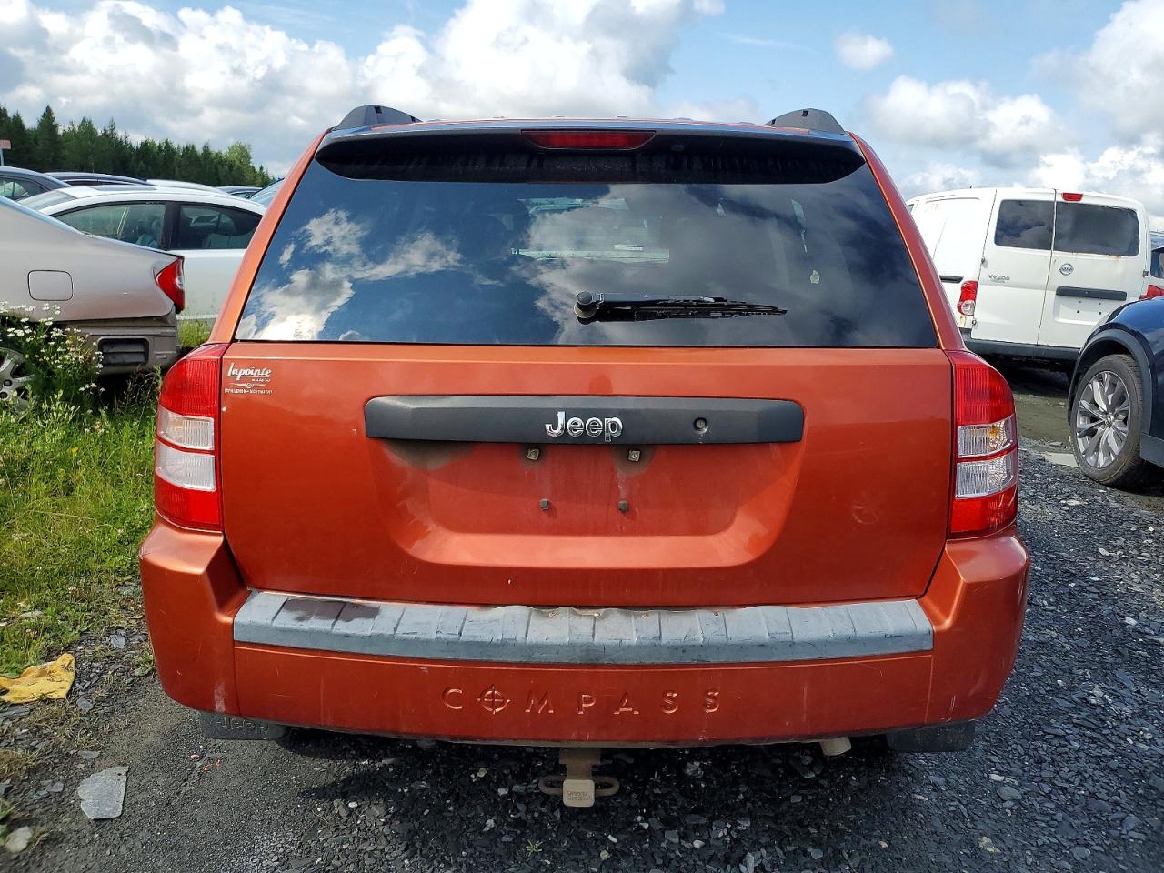 2009 Jeep Compass Sport Orange vin: 1J4FT47B19D195865