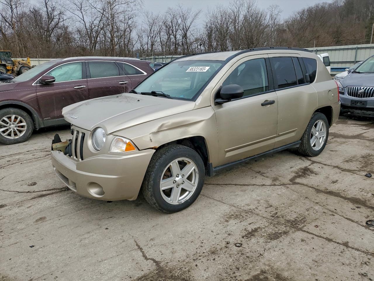2009 Jeep Compass Sport Tan vin: 1J4FT47B19D201860