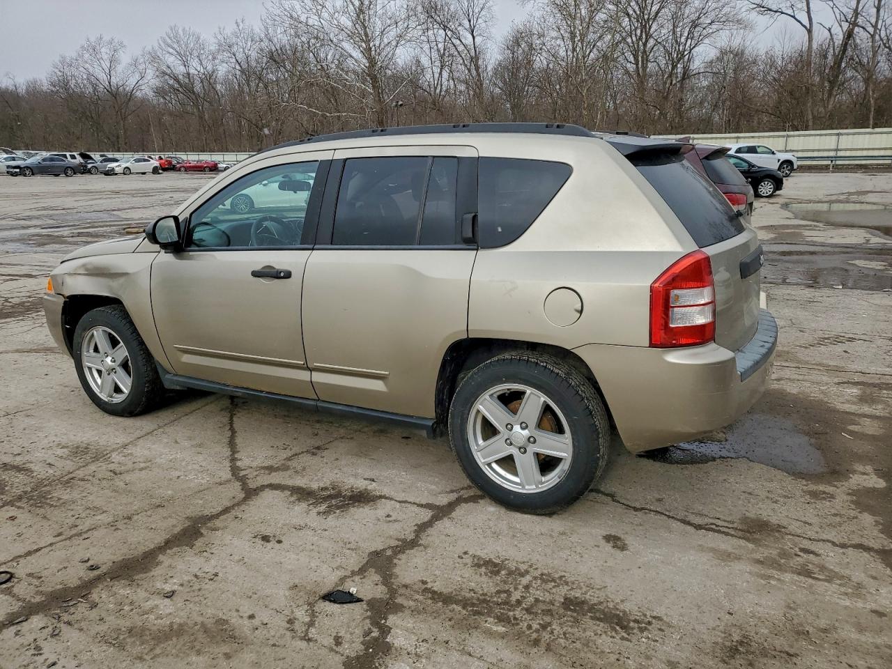 2009 Jeep Compass Sport Tan vin: 1J4FT47B19D201860