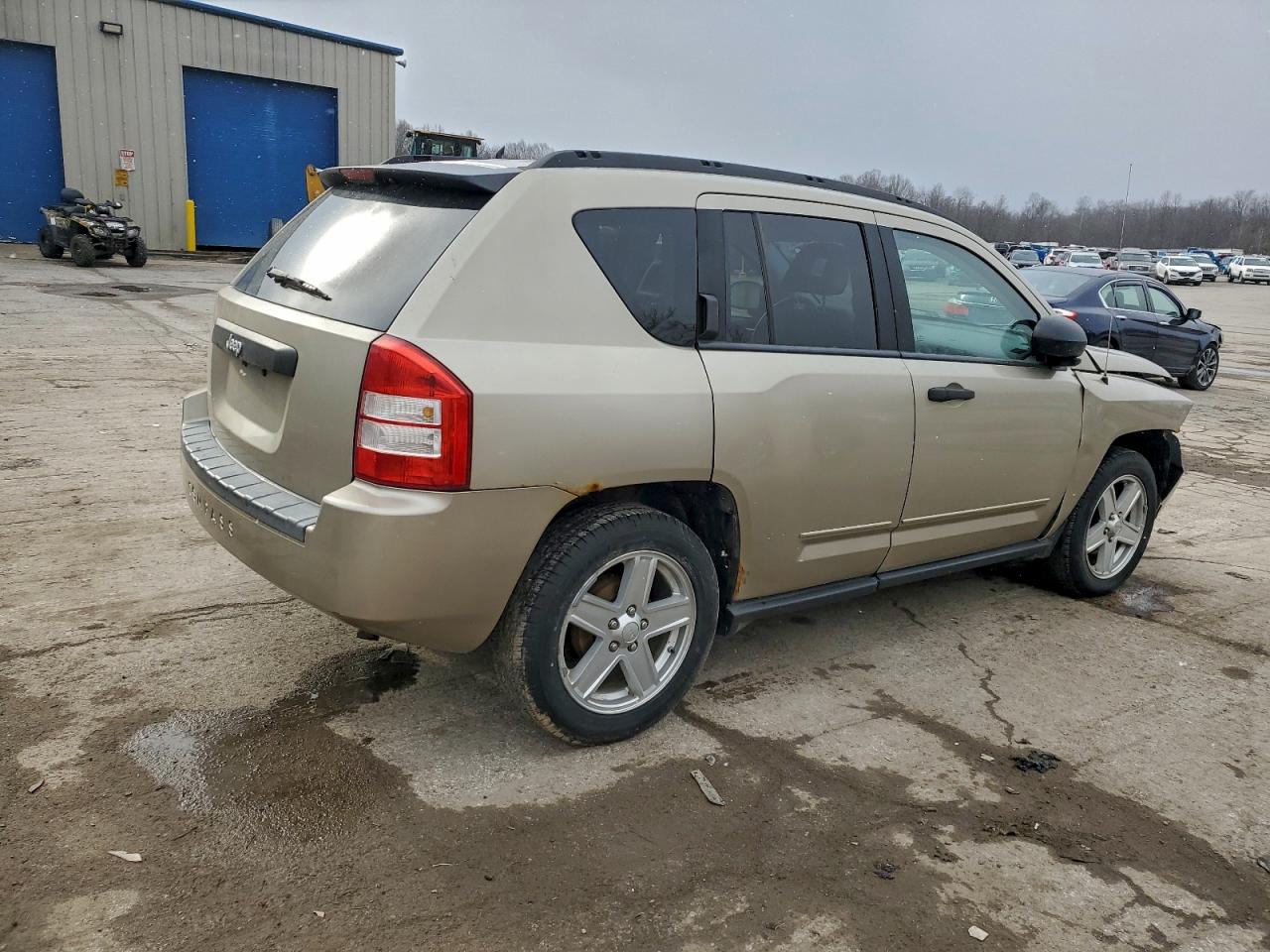 2009 Jeep Compass Sport Tan vin: 1J4FT47B19D201860