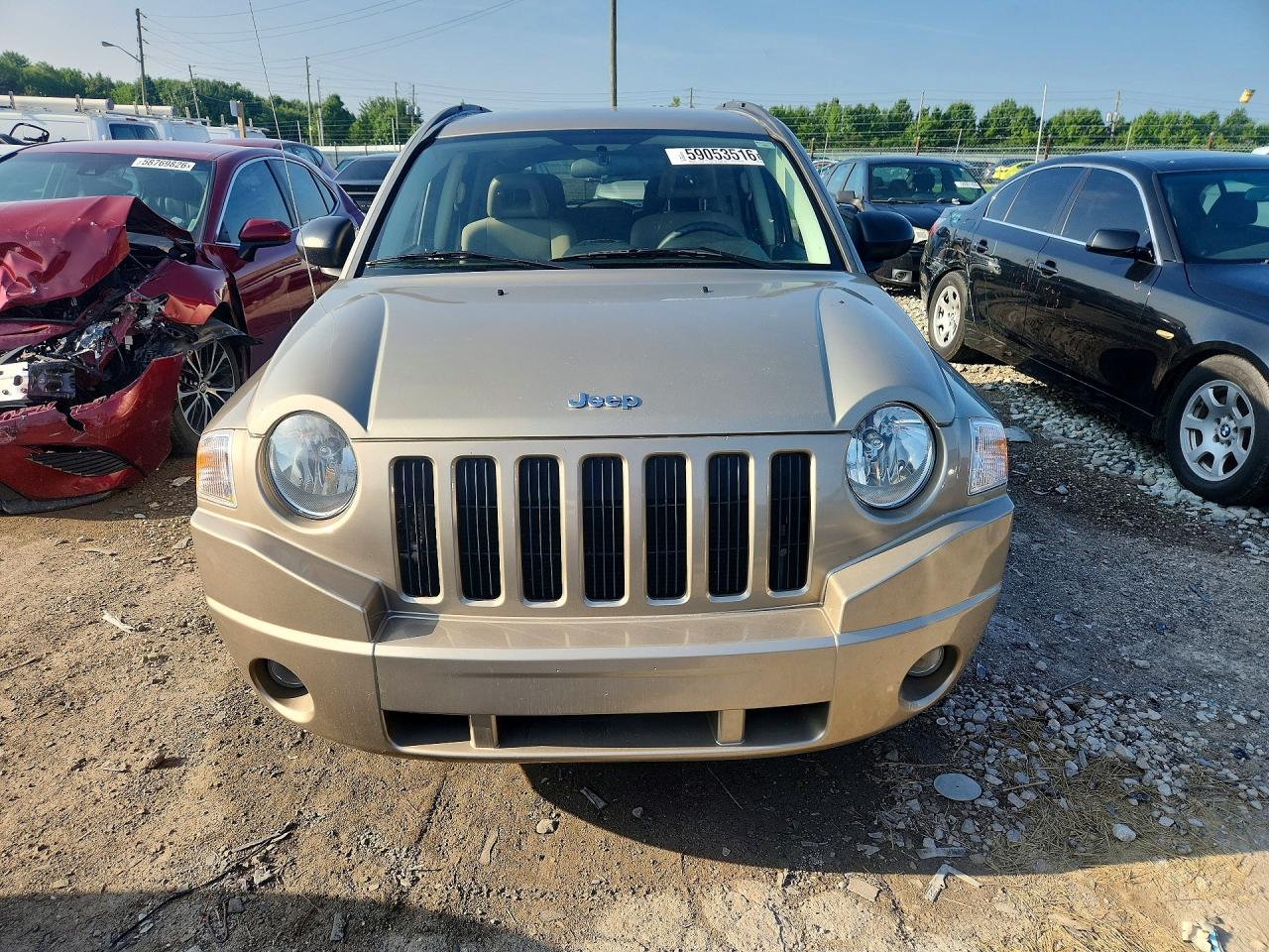 2009 Jeep Compass Sport Tan vin: 1J4FT47B29D223303