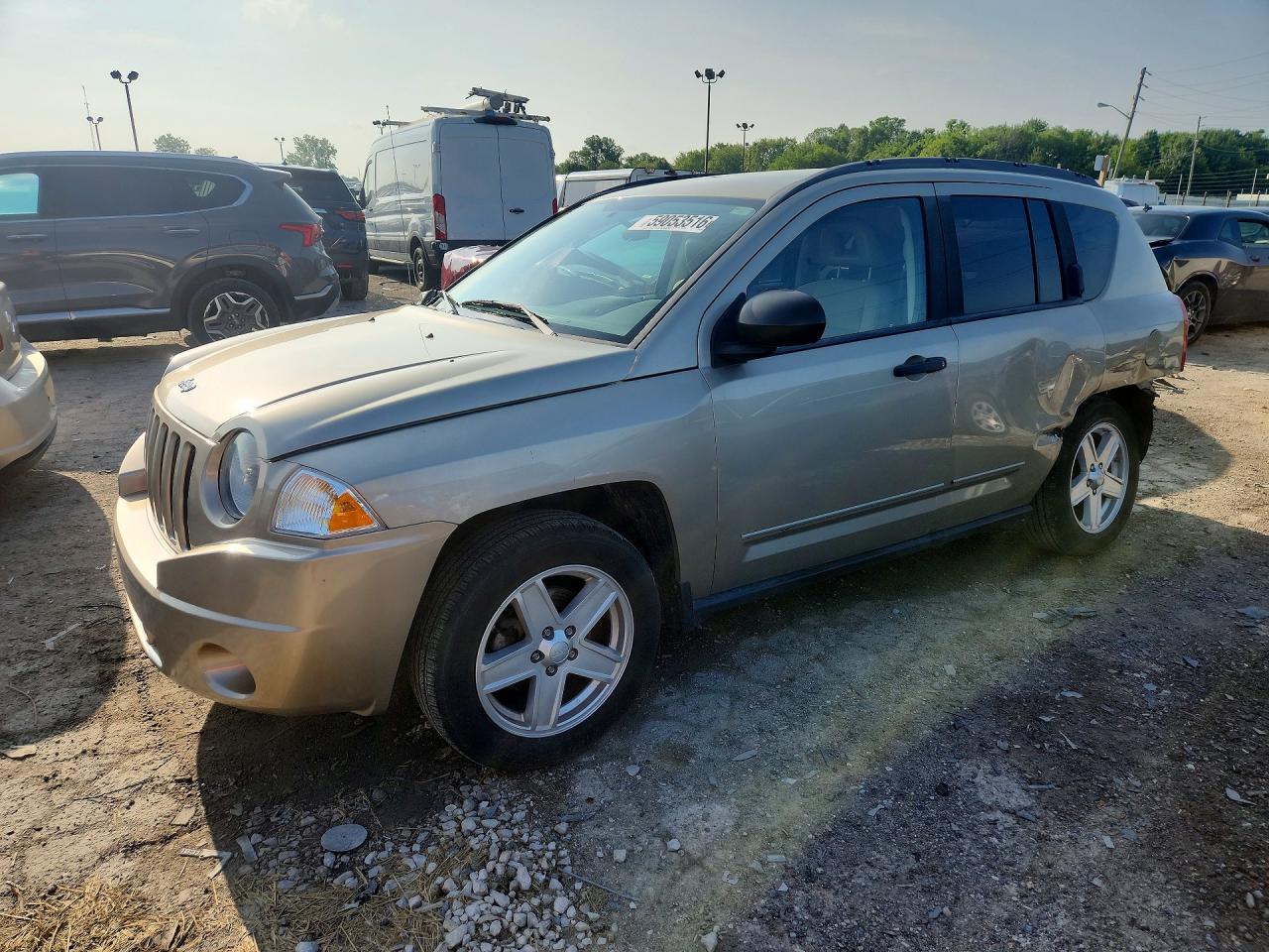 2009 Jeep Compass Sport Tan vin: 1J4FT47B29D223303