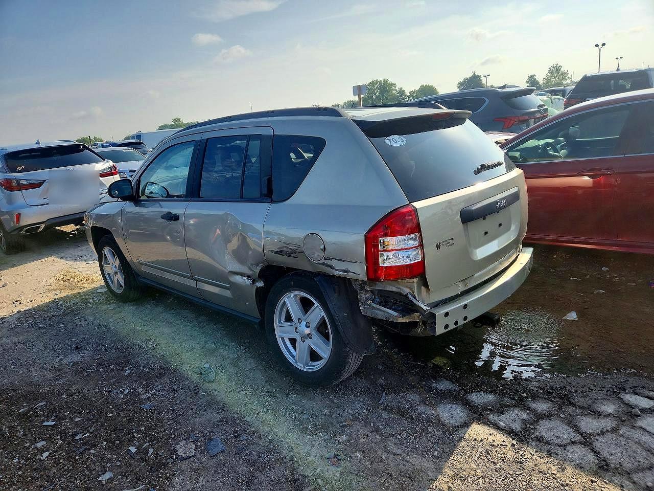 2009 Jeep Compass Sport Tan vin: 1J4FT47B29D223303