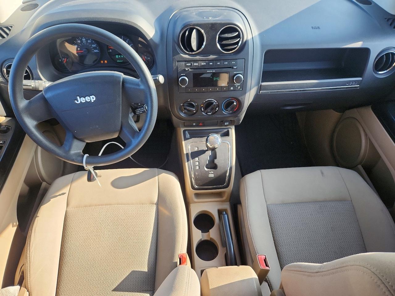 2009 Jeep Compass Sport Tan vin: 1J4FT47B29D223303