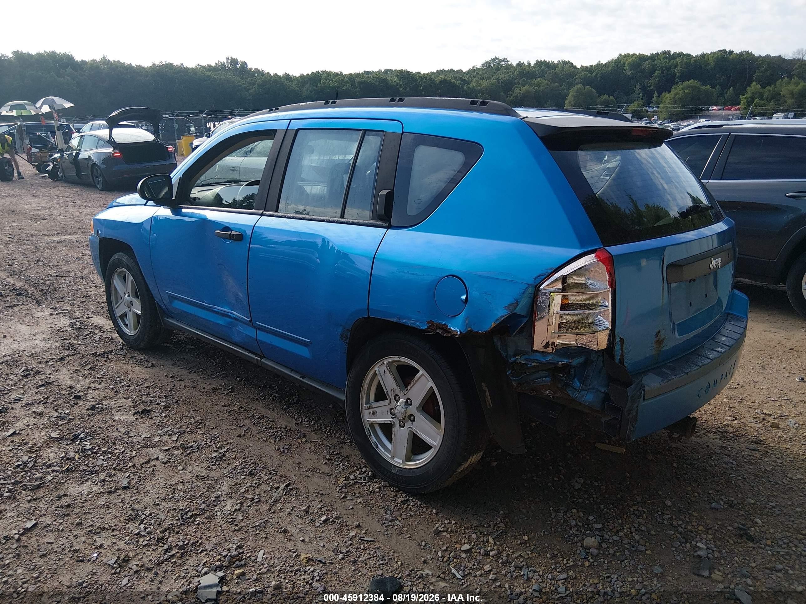 2009 Jeep Compass Sport Light Blue vin: 1J4FT47B49D102563