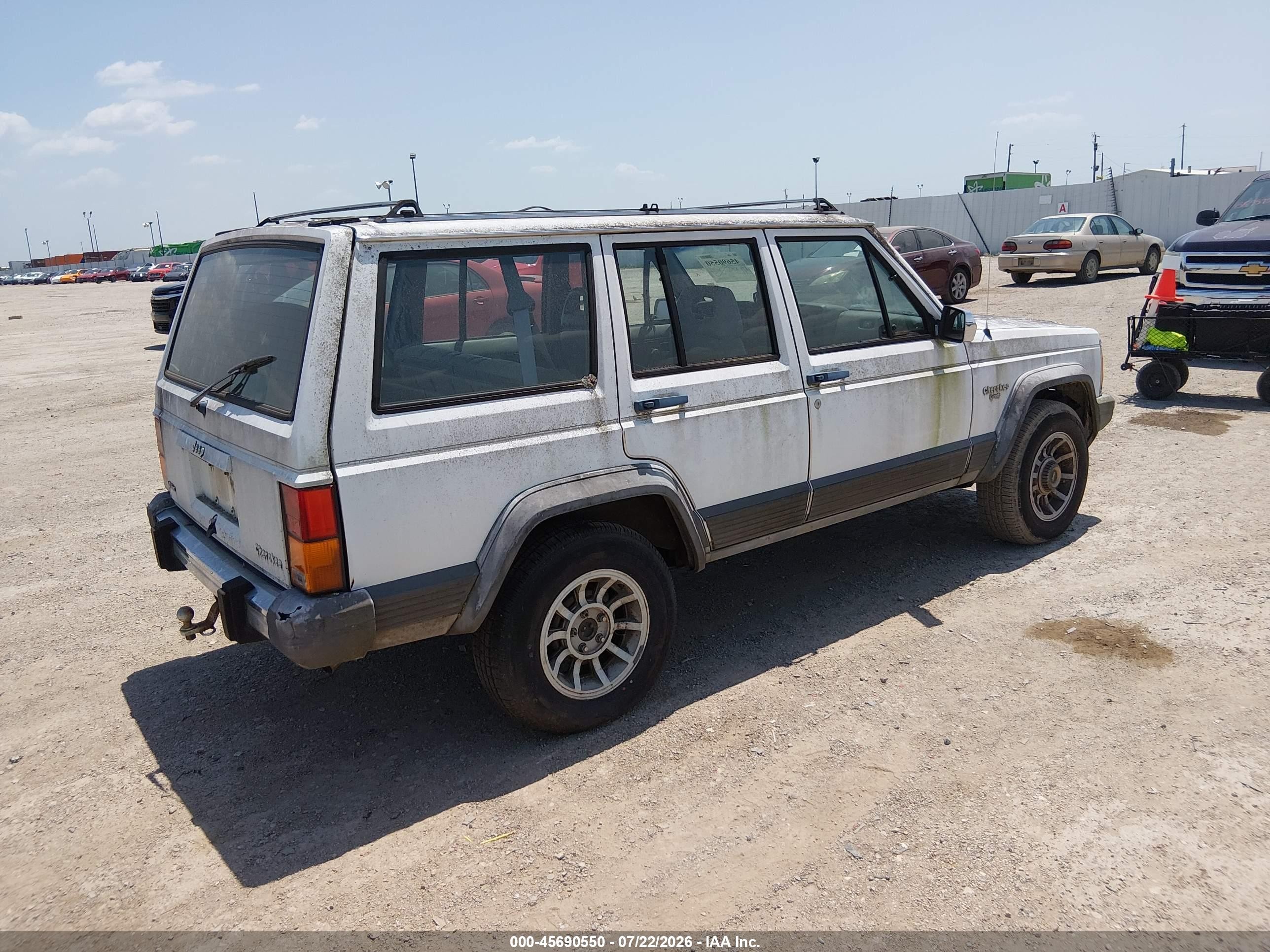 1990 Jeep Cherokee Laredo White vin: 1J4FT58L9LL171307