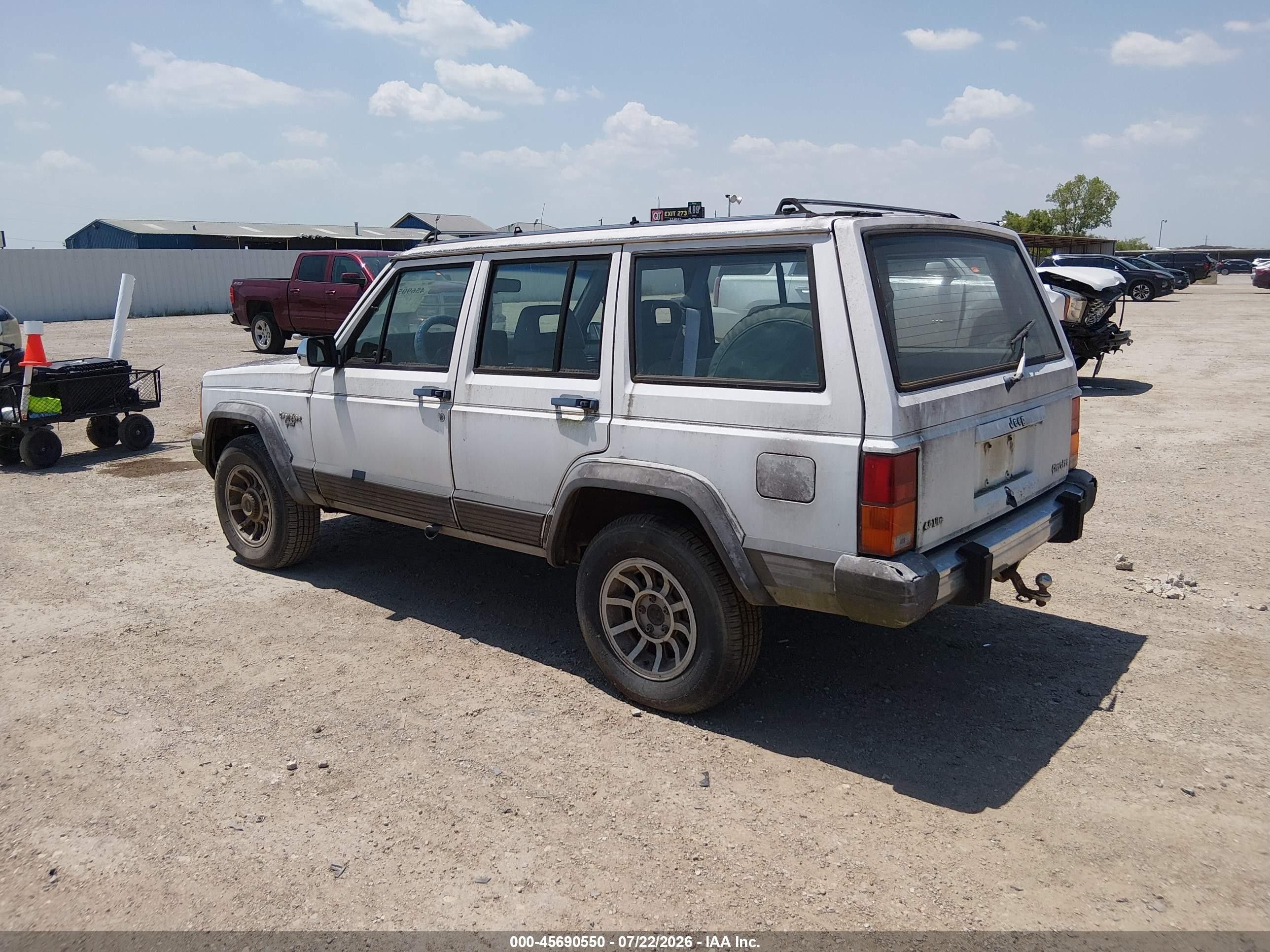 1990 Jeep Cherokee Laredo White vin: 1J4FT58L9LL171307