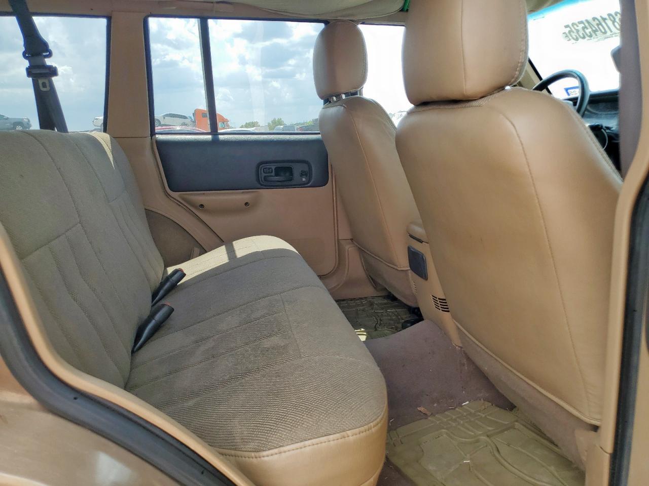 1999 Jeep Cherokee Sport Желто-коричневый vin: 1J4FT68S8XL505703