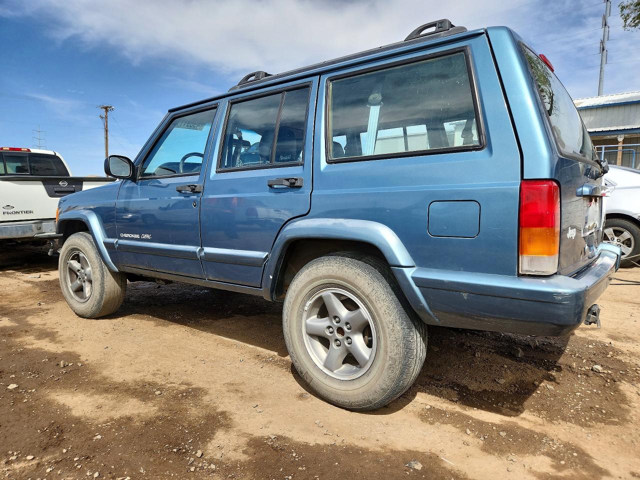 1999 Jeep Cherokee Sport Blue vin: 1J4FT68S9XL613991
