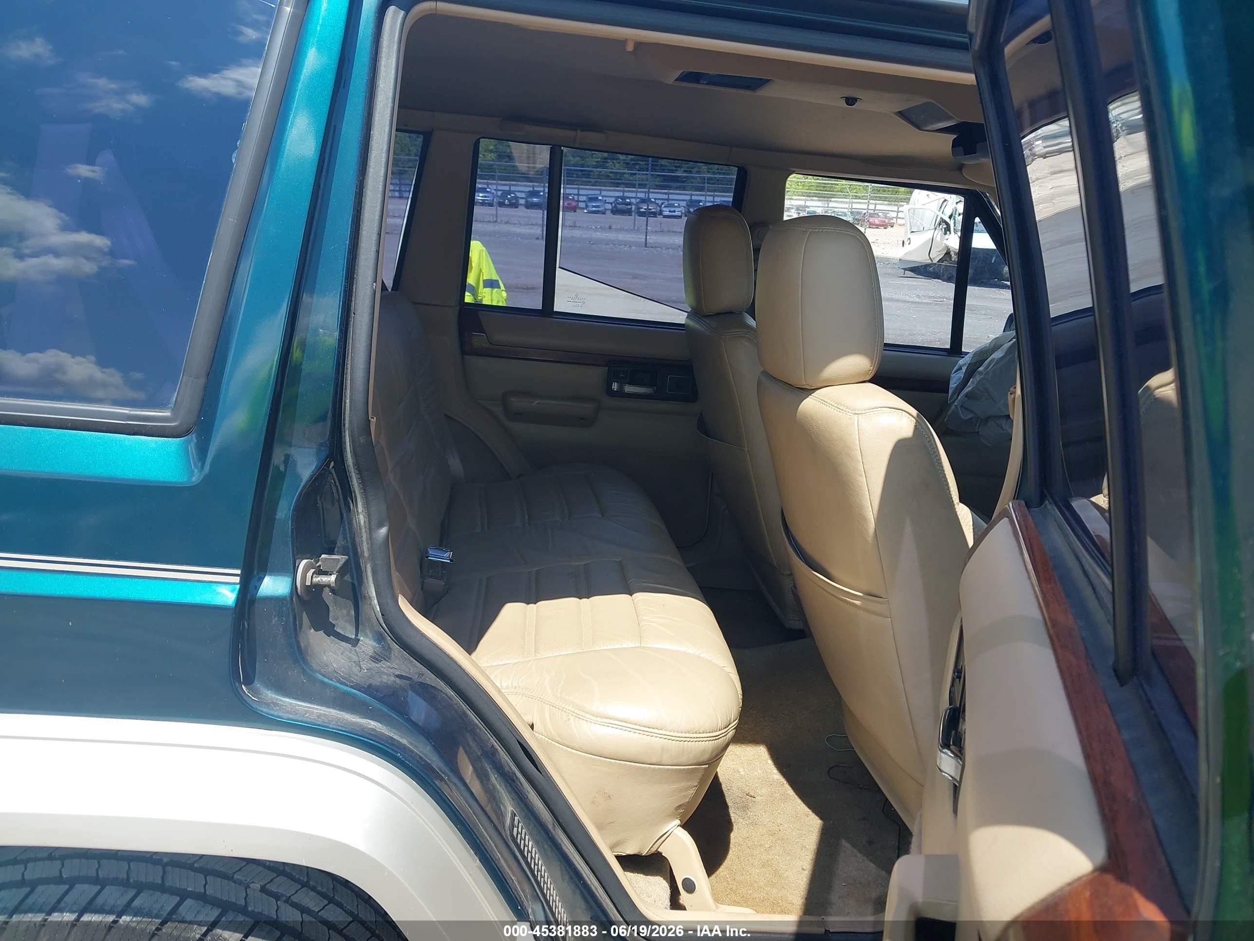 1995 Jeep Cherokee Country Green vin: 1J4FT78S1SL602434