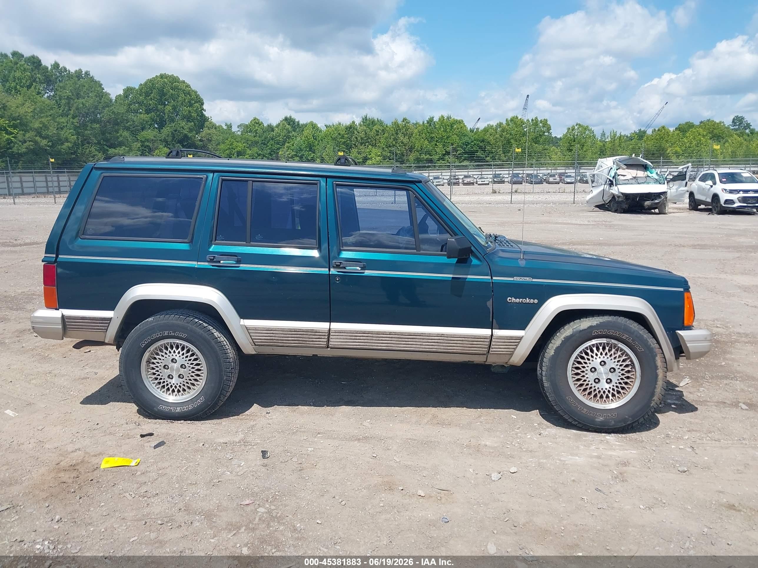 1995 Jeep Cherokee Country Green vin: 1J4FT78S1SL602434
