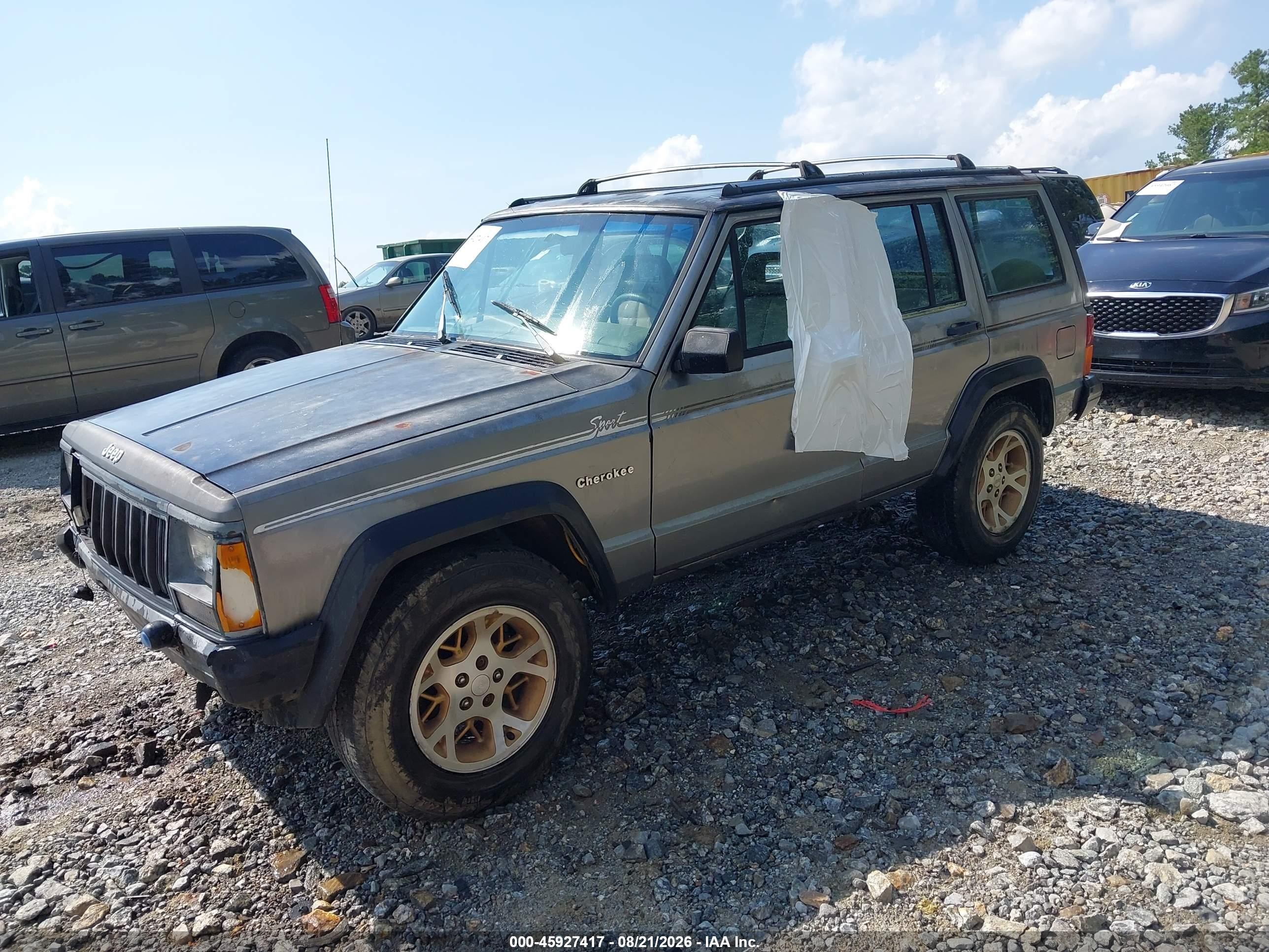 1992 Jeep Cherokee Sport Gray vin: 1J4FT88S9NL136830