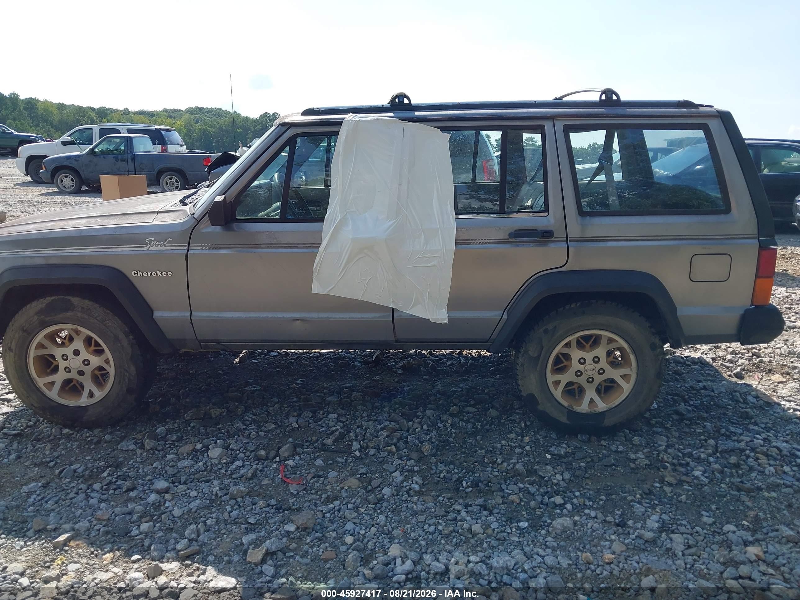 1992 Jeep Cherokee Sport Gray vin: 1J4FT88S9NL136830