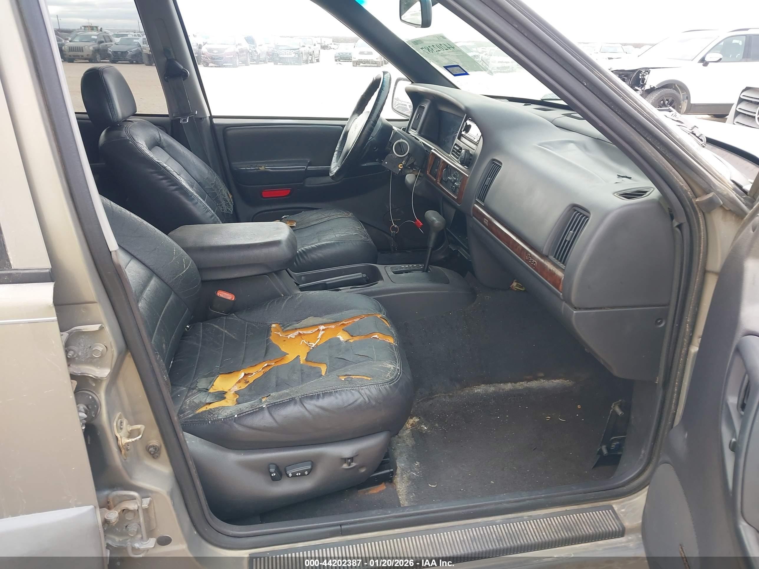1997 Jeep Grand Cherokee Laredo/tsi Gold vin: 1J4FX58S1VC735403