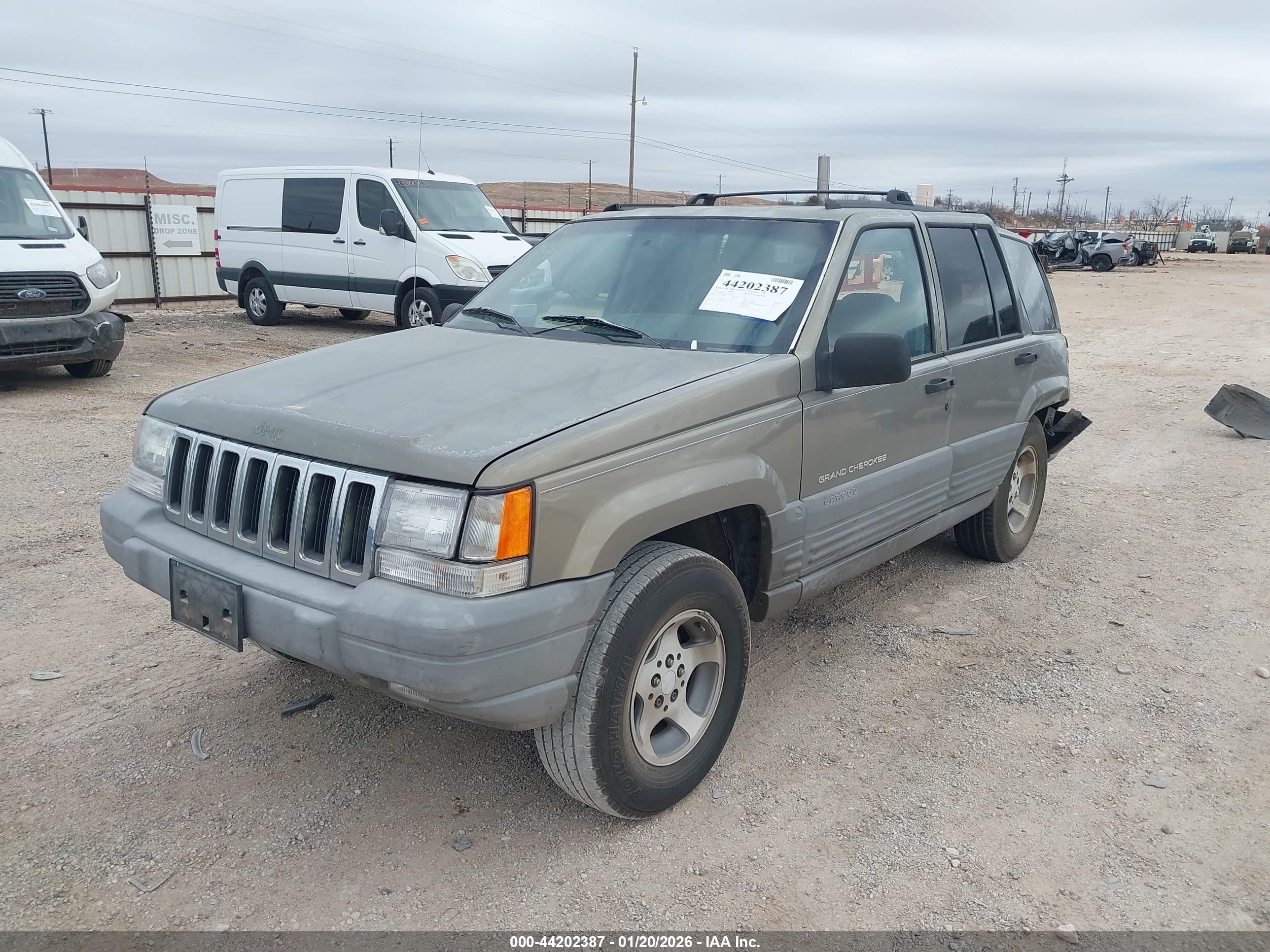 1997 Jeep Grand Cherokee Laredo/tsi Gold vin: 1J4FX58S1VC735403